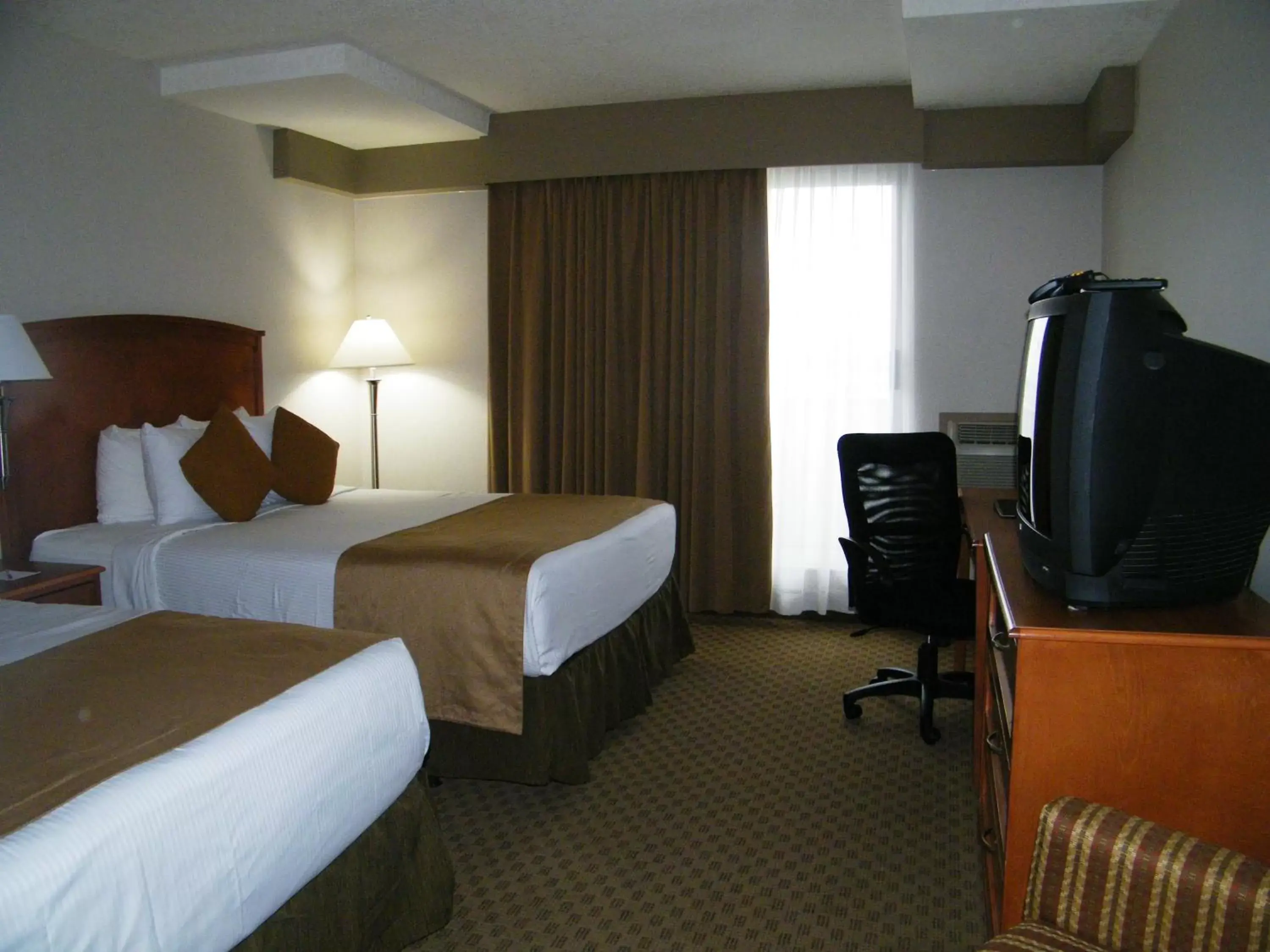 Bed in Ramada by Wyndham Edmonton South