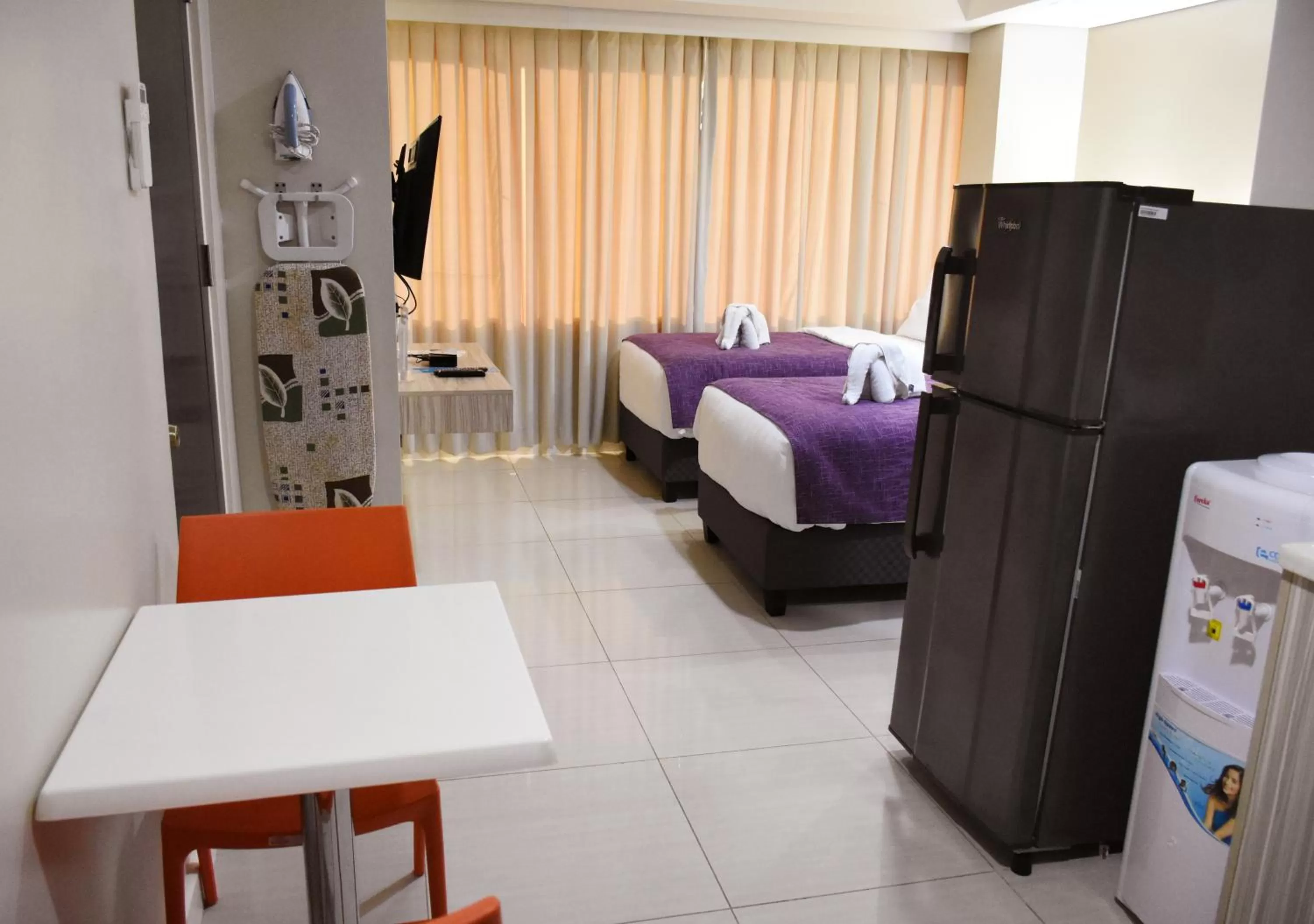 Bed in Alicia Apartelle