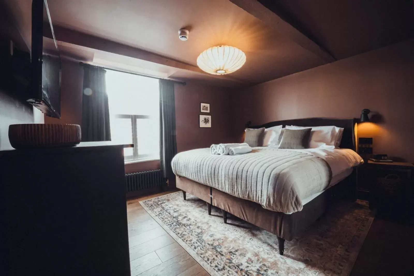 Bed in The Silk Rooms, at The Freemasons Inn