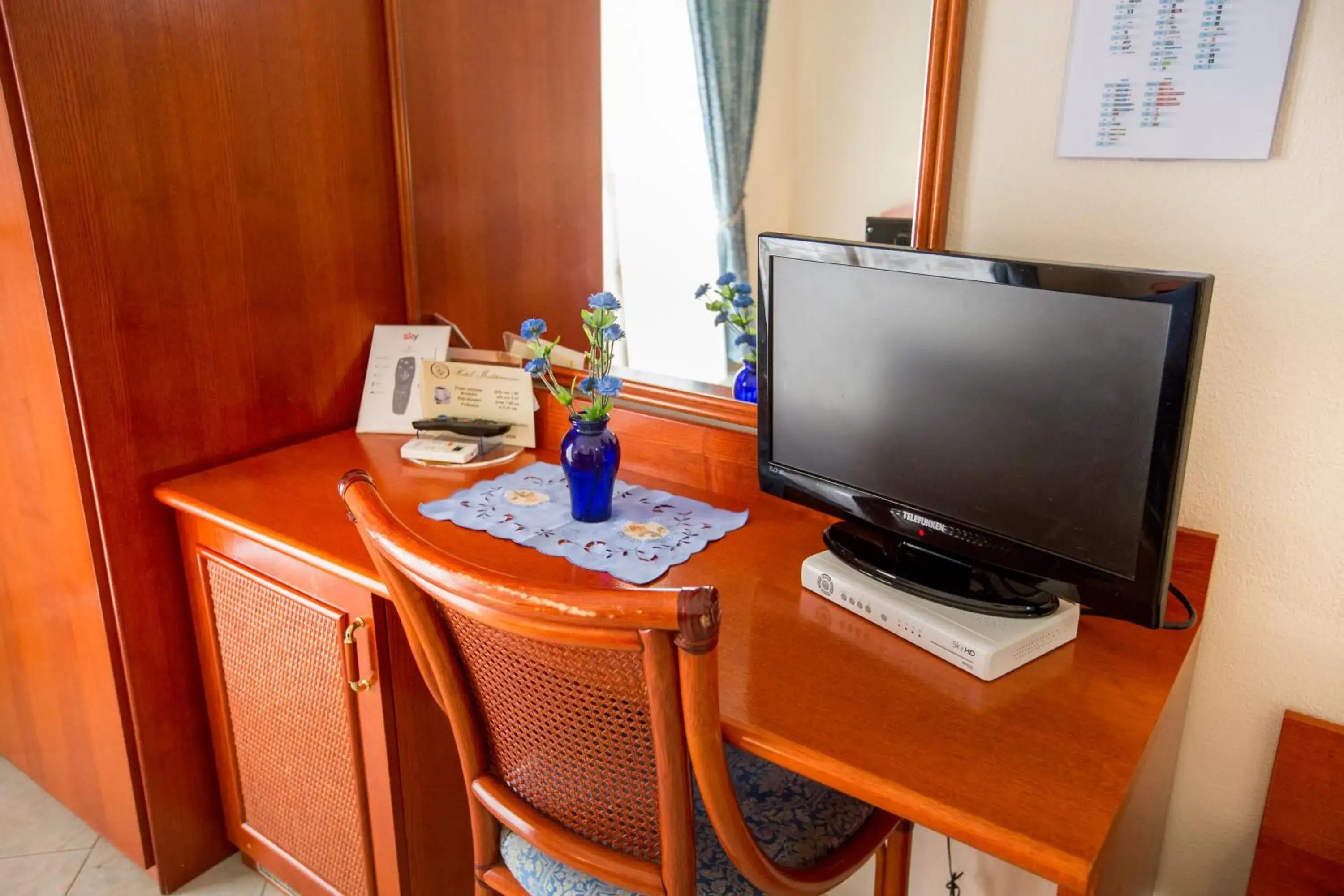 TV and multimedia, TV/Entertainment Center in Hotel Mediterraneo