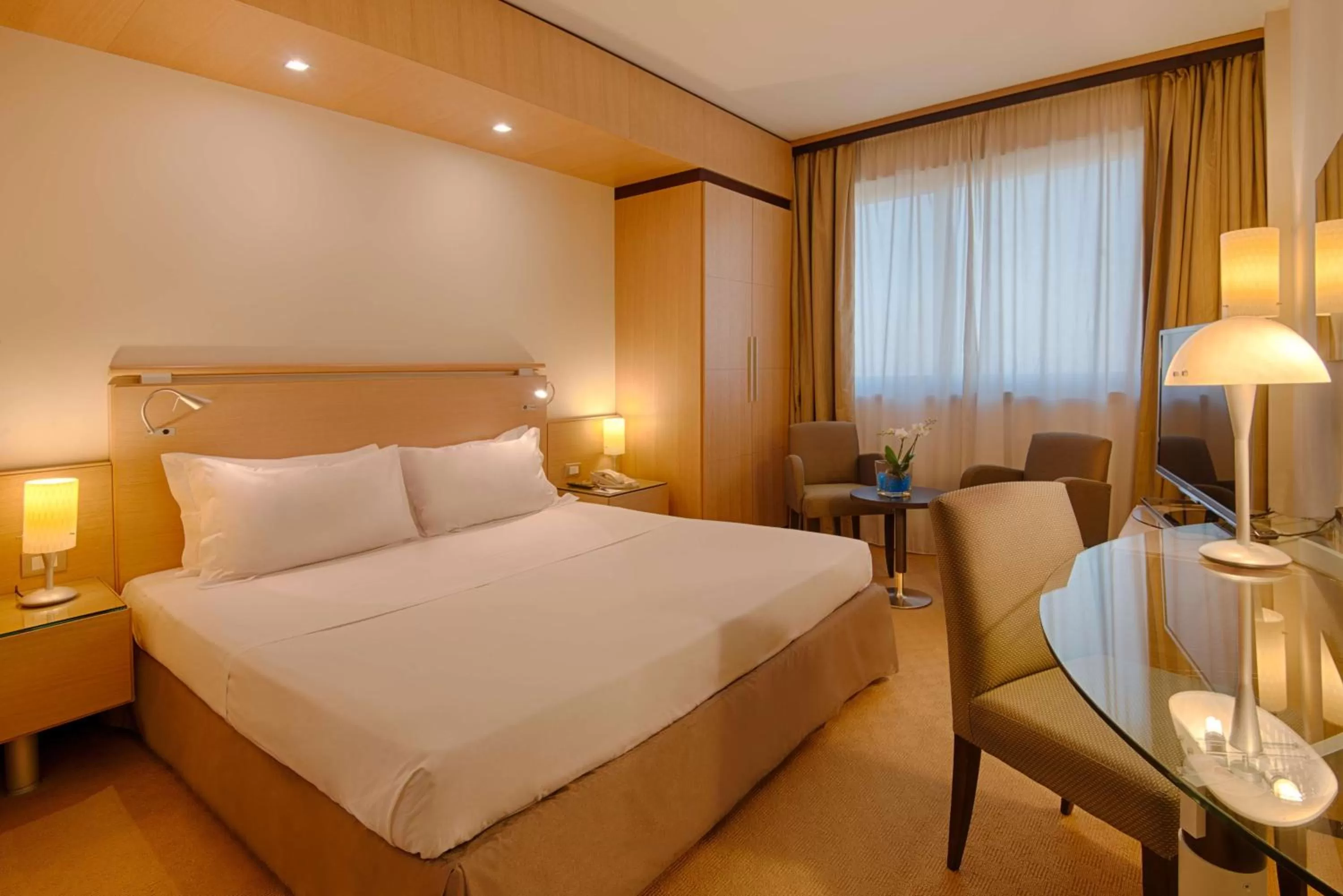 Family Connecting Room with Extra Bed (3 Adults + 2 Children) in NH Bologna Villanova