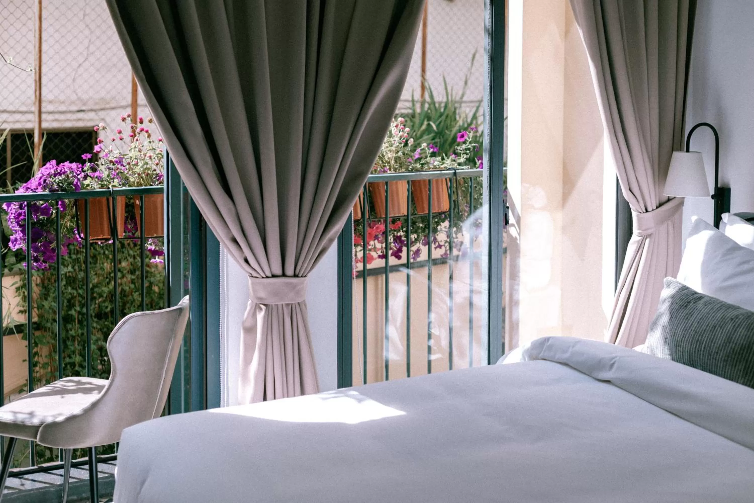 Balcony/Terrace, Bed in La Chronique Hotel