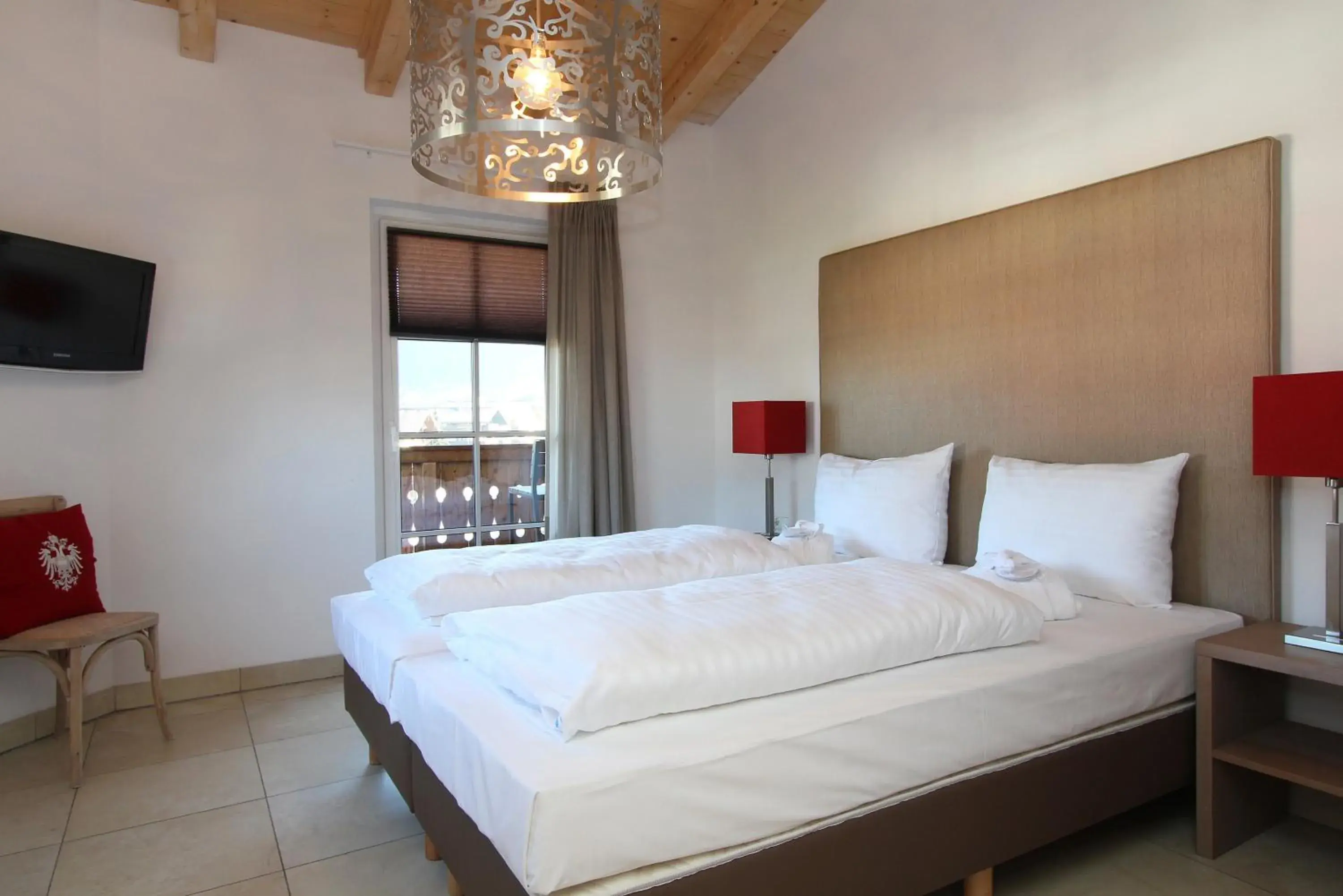 Bed in Avenida Mountain Resort by Alpin Rentals