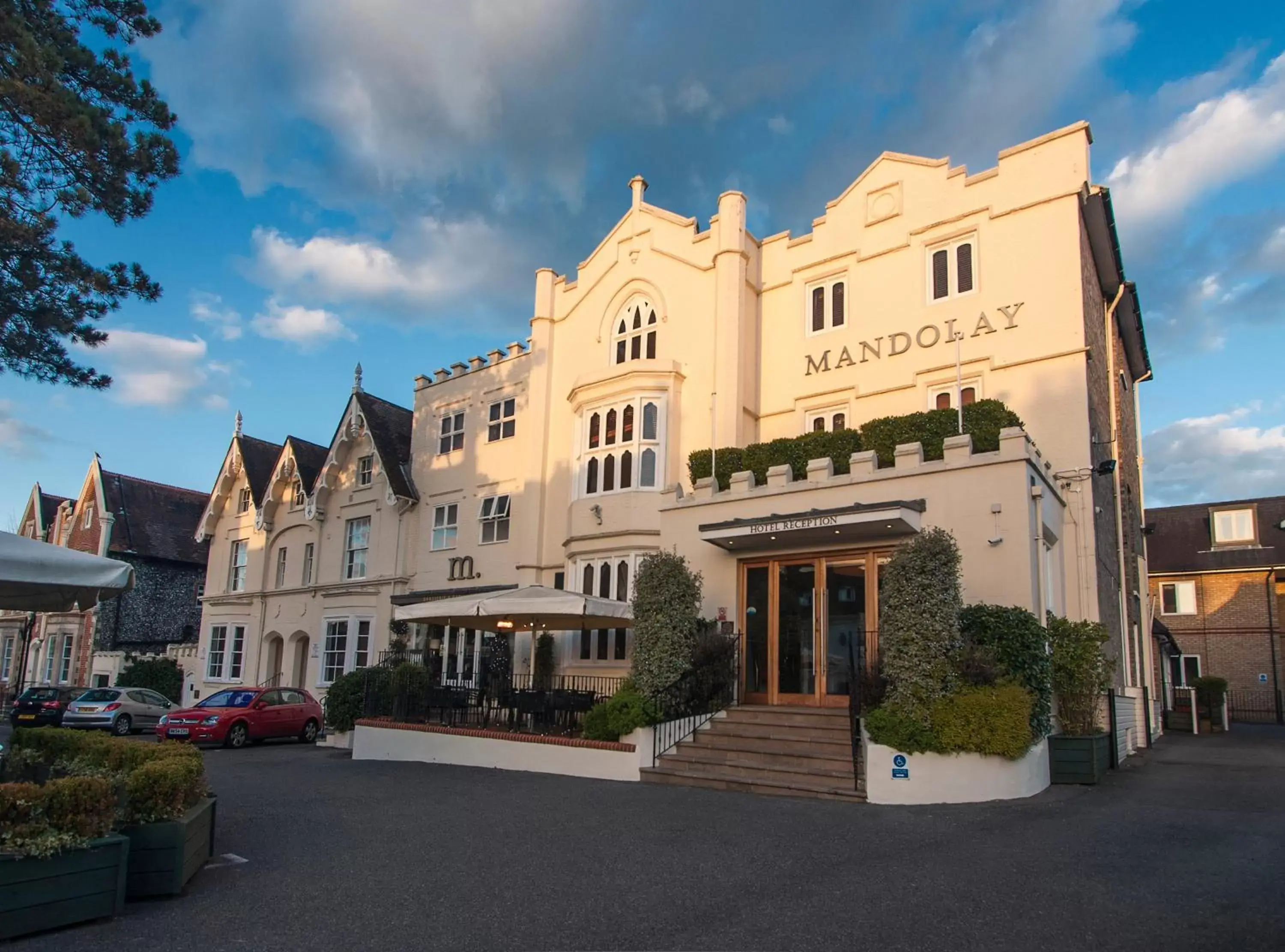 Facade/entrance, Property Building in Mandolay Hotel Guildford