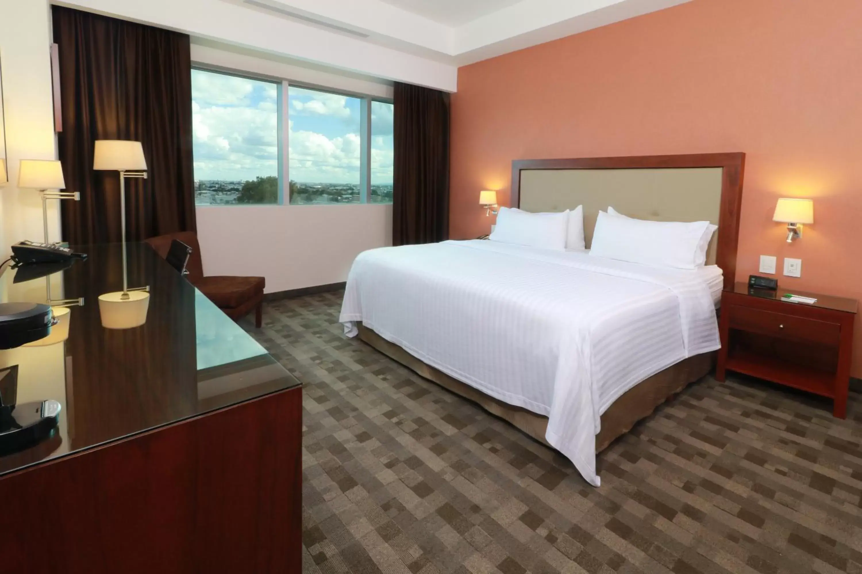 Photo of the whole room, Bed in Holiday Inn & Suites Plaza Mayor, an IHG Hotel