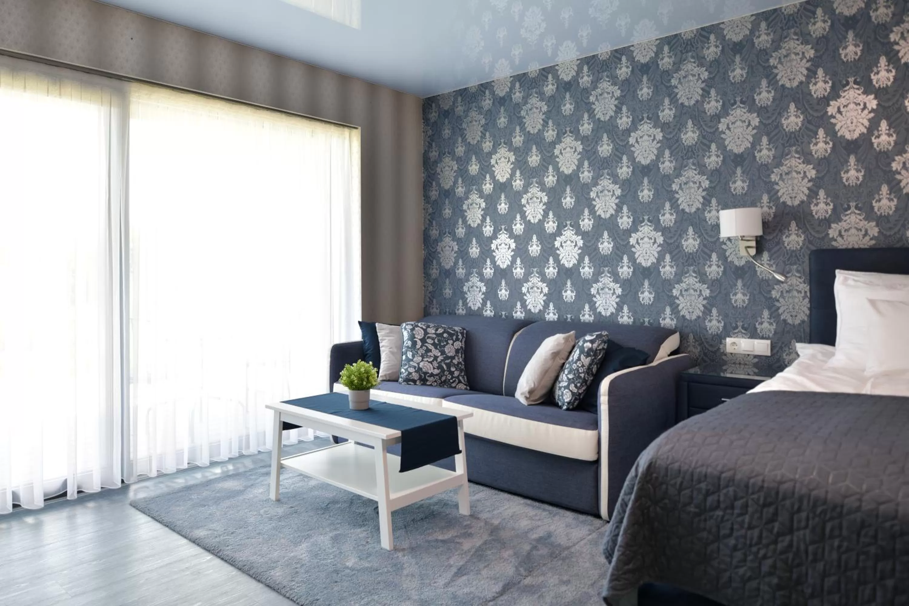 Photo of the whole room, Bed in TI Hotel