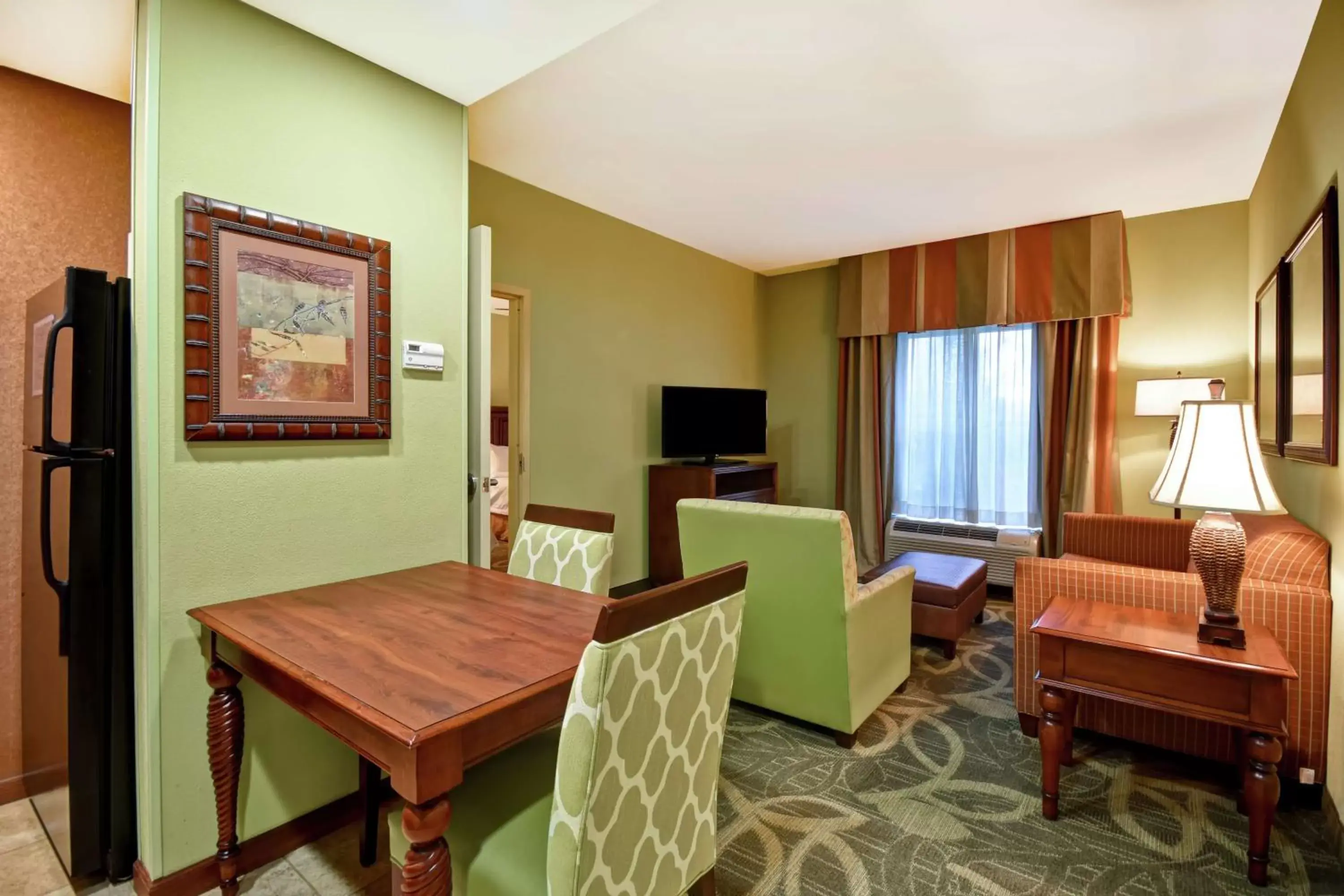 Bedroom, Dining Area in Homewood Suites by Hilton Ocala at Heath Brook