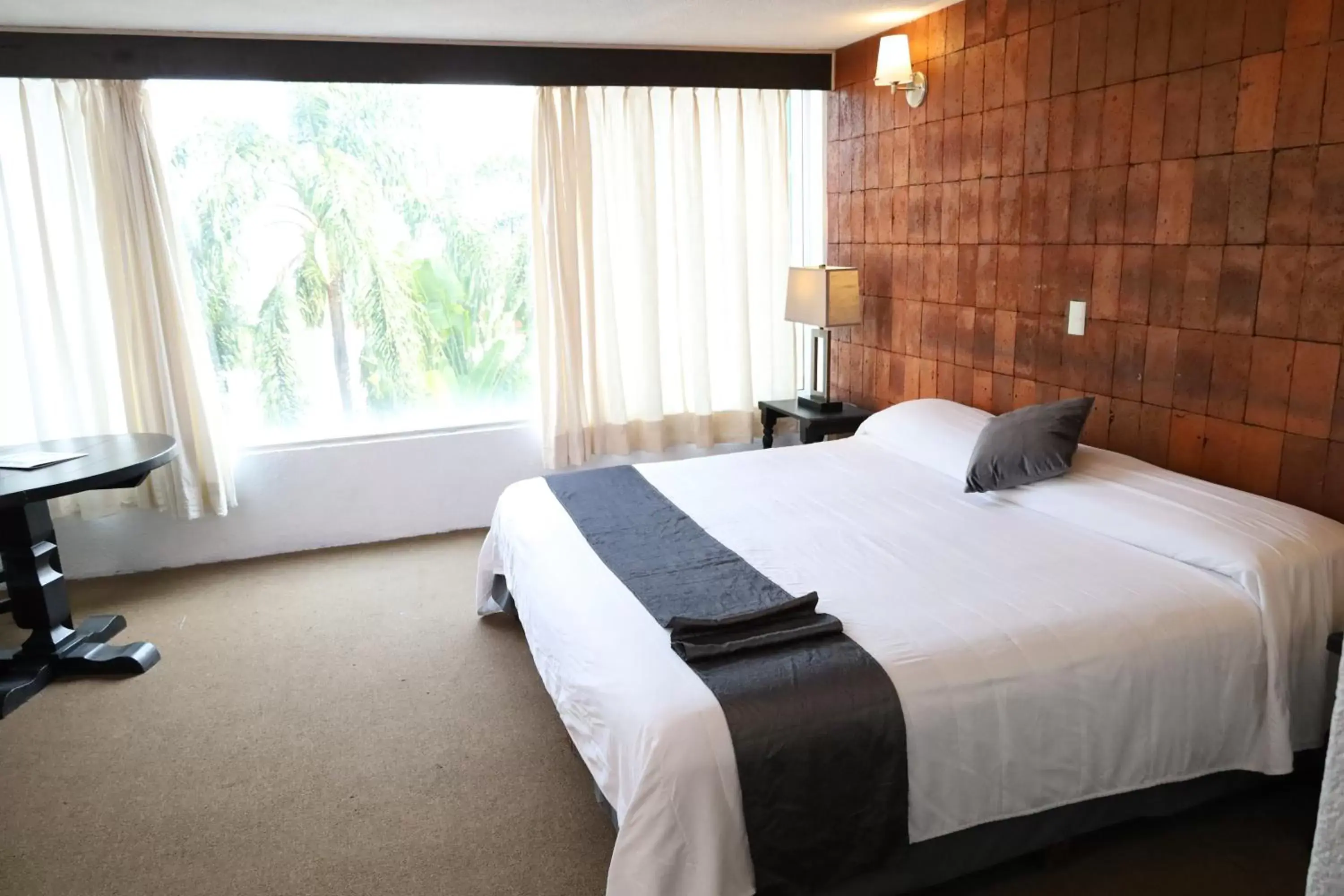 Bed in Hotel Grand Vista Cuernavaca