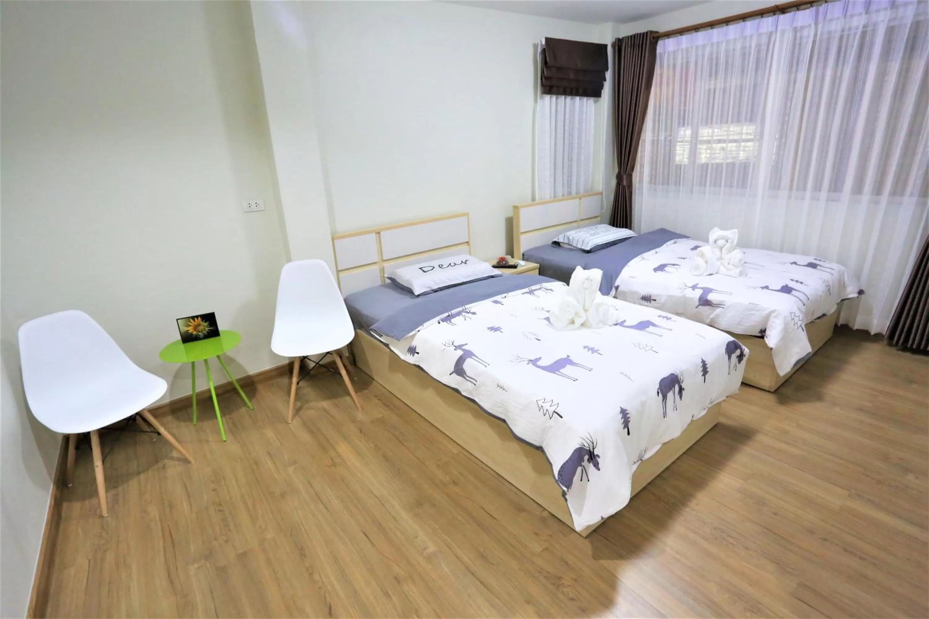 Photo of the whole room, Bed in TD Bangkok