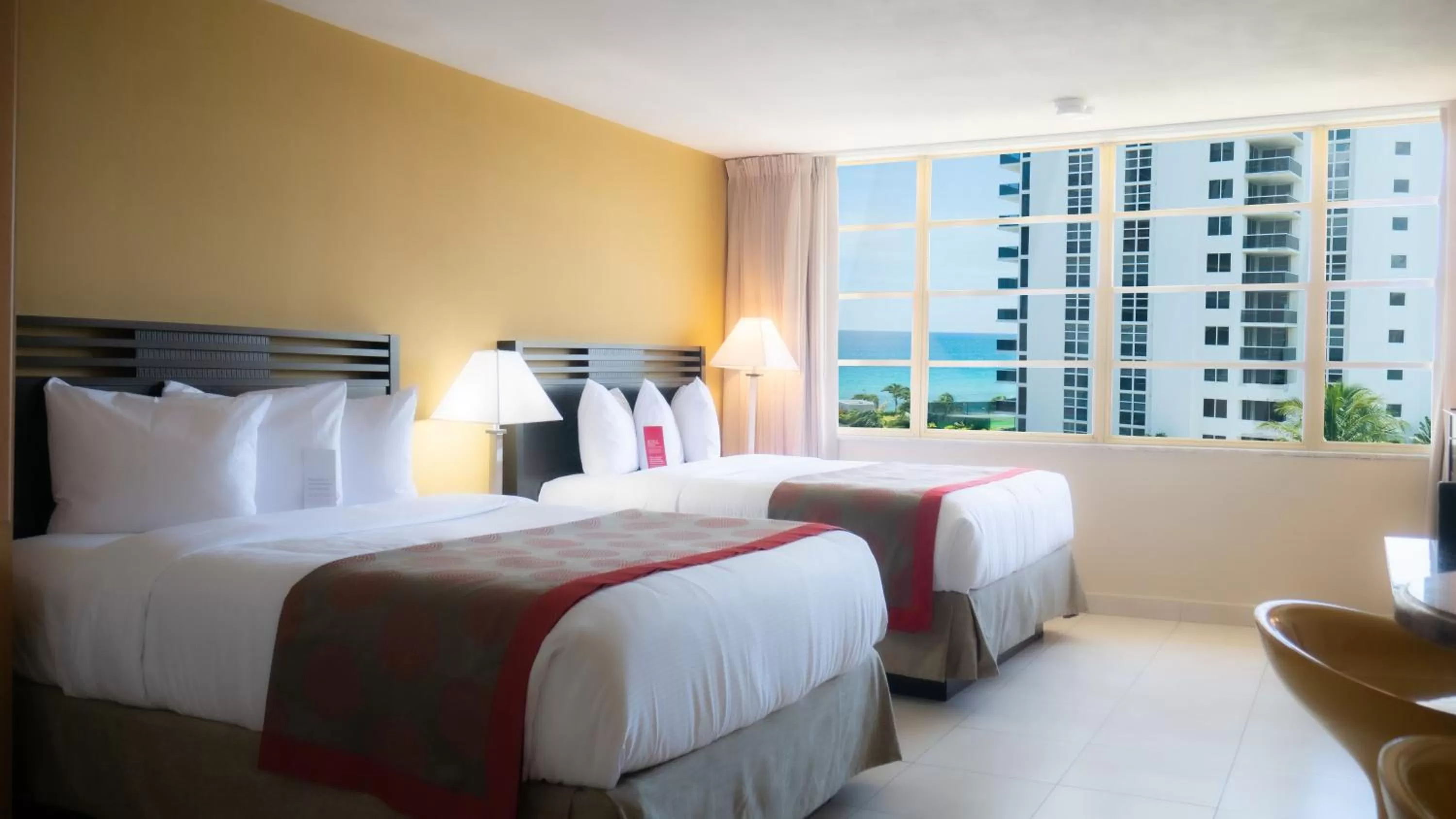 Bed in Ramada Plaza by Wyndham Marco Polo Beach Resort