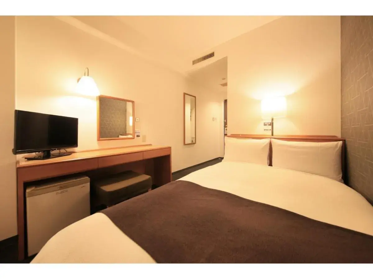 Bed in Smile Hotel Tokyo Ayase Ekimae