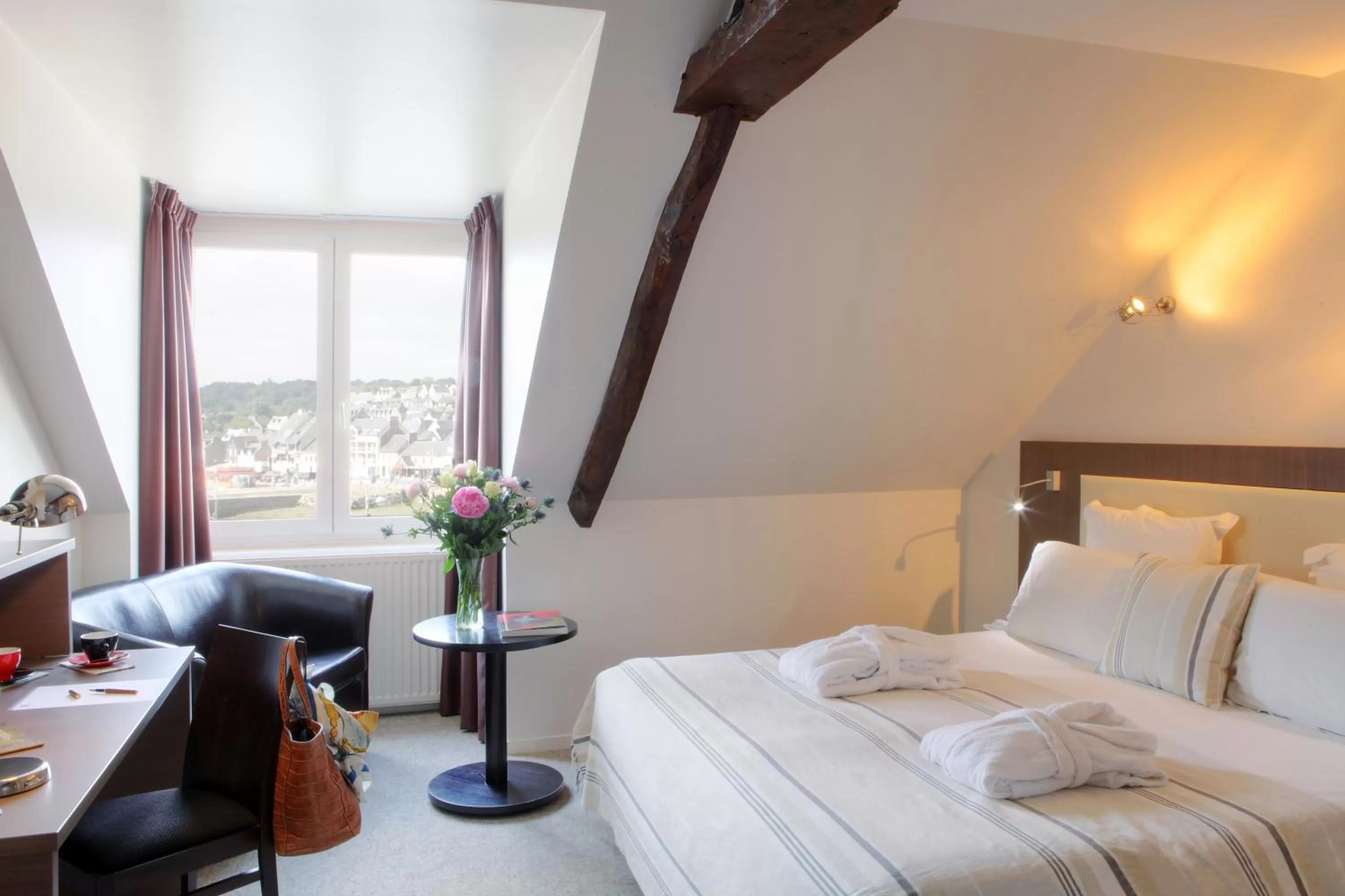 Photo of the whole room, Bed in Hôtel Le Benhuyc