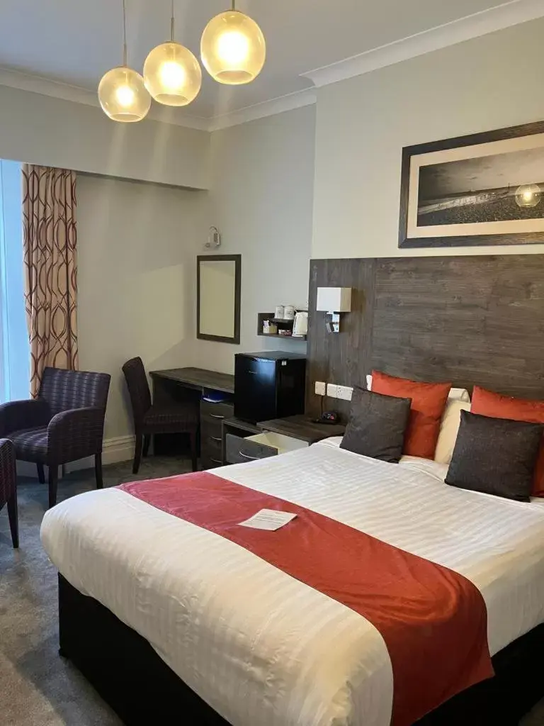 Bed in Marsham Court Hotel