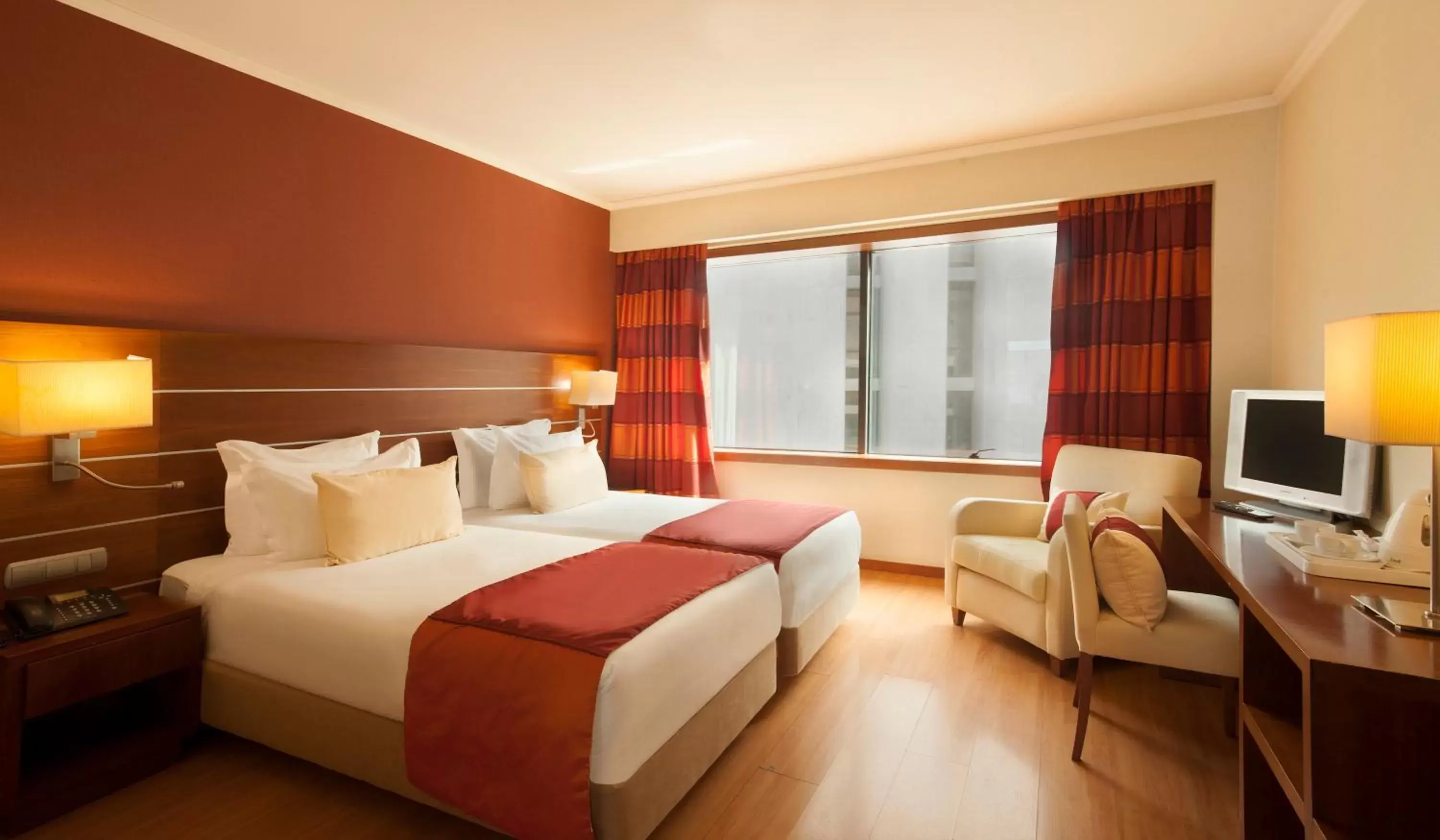 Bed in TURIM Europa Hotel