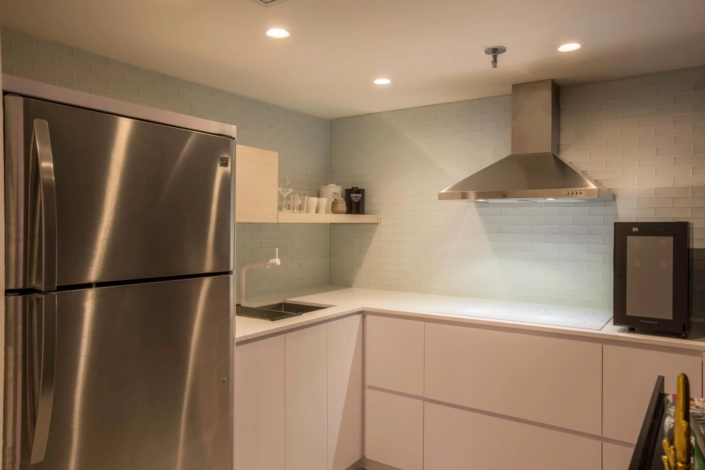 Kitchen or kitchenette in OCEAN VIEW DELUXE SUITE: PVT. BEACH & POOL