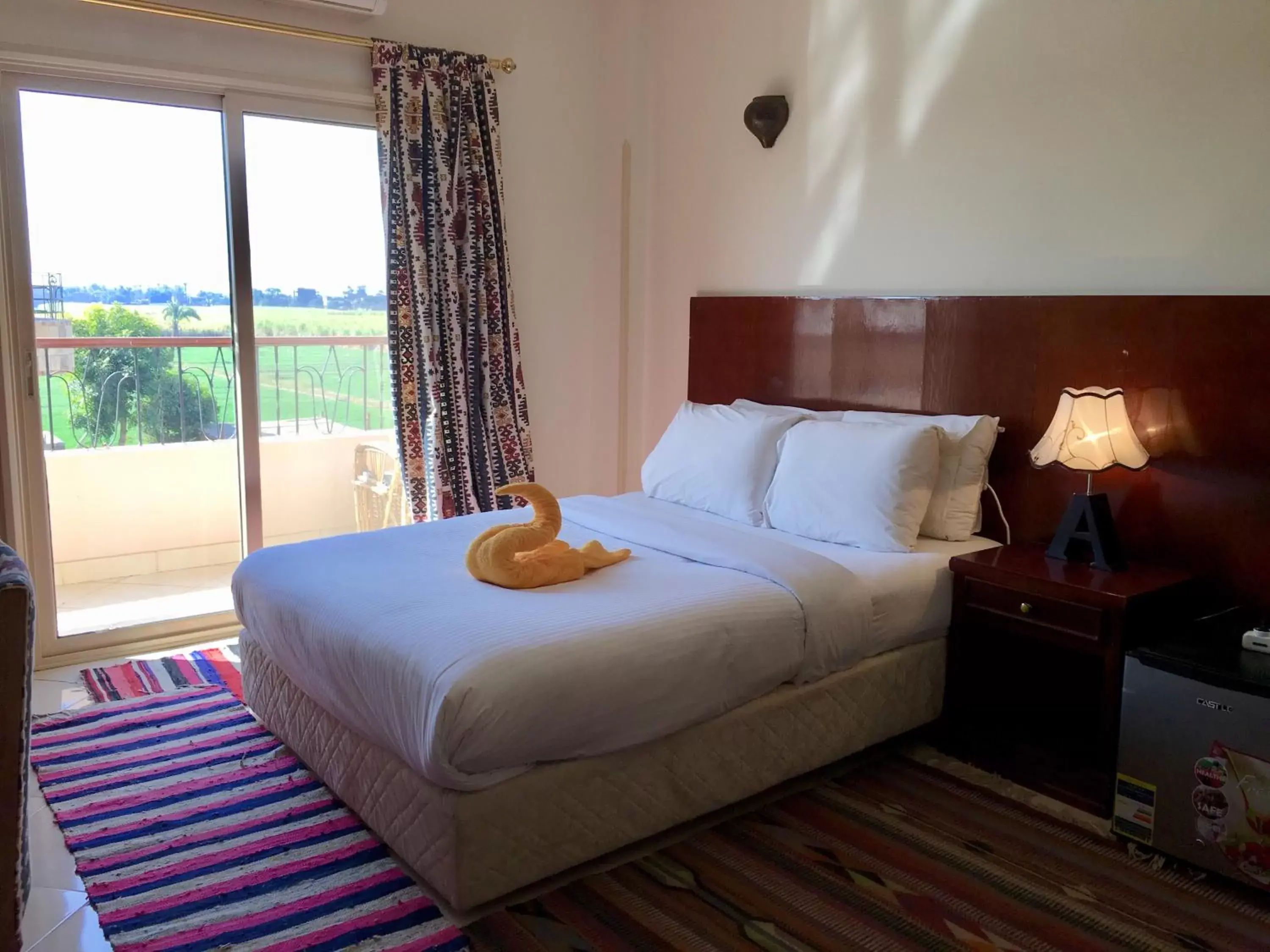 Bed in New Memnon Hotel