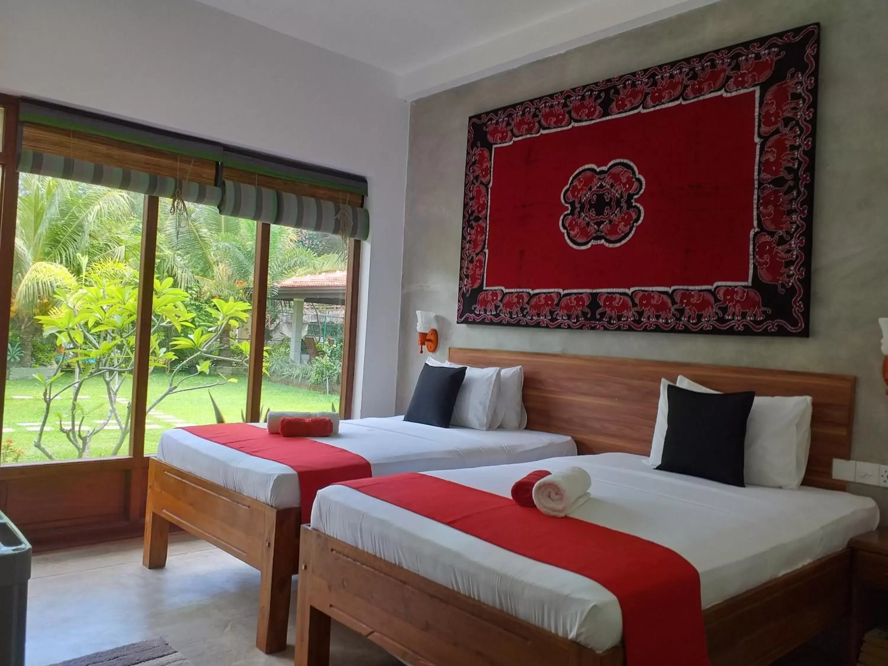Deluxe Twin Room with Garden & Canal View - single occupancy in Green Wood Villa Negombo Deluxe Twin Room with Garden & Canal View - single occupancy in Green Wood Villa Negombo