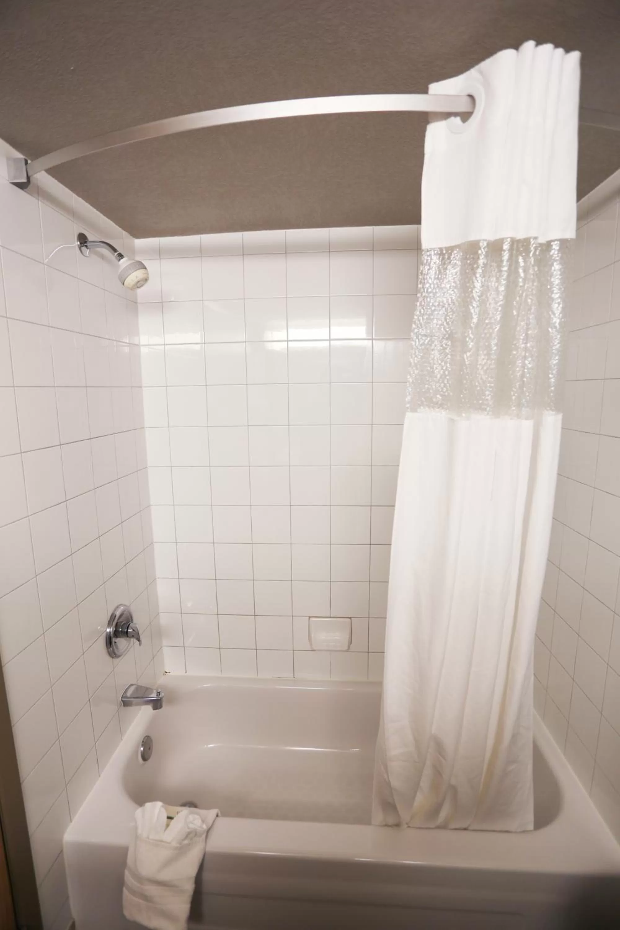 Bathroom in Days Inn by Wyndham Calgary Airport