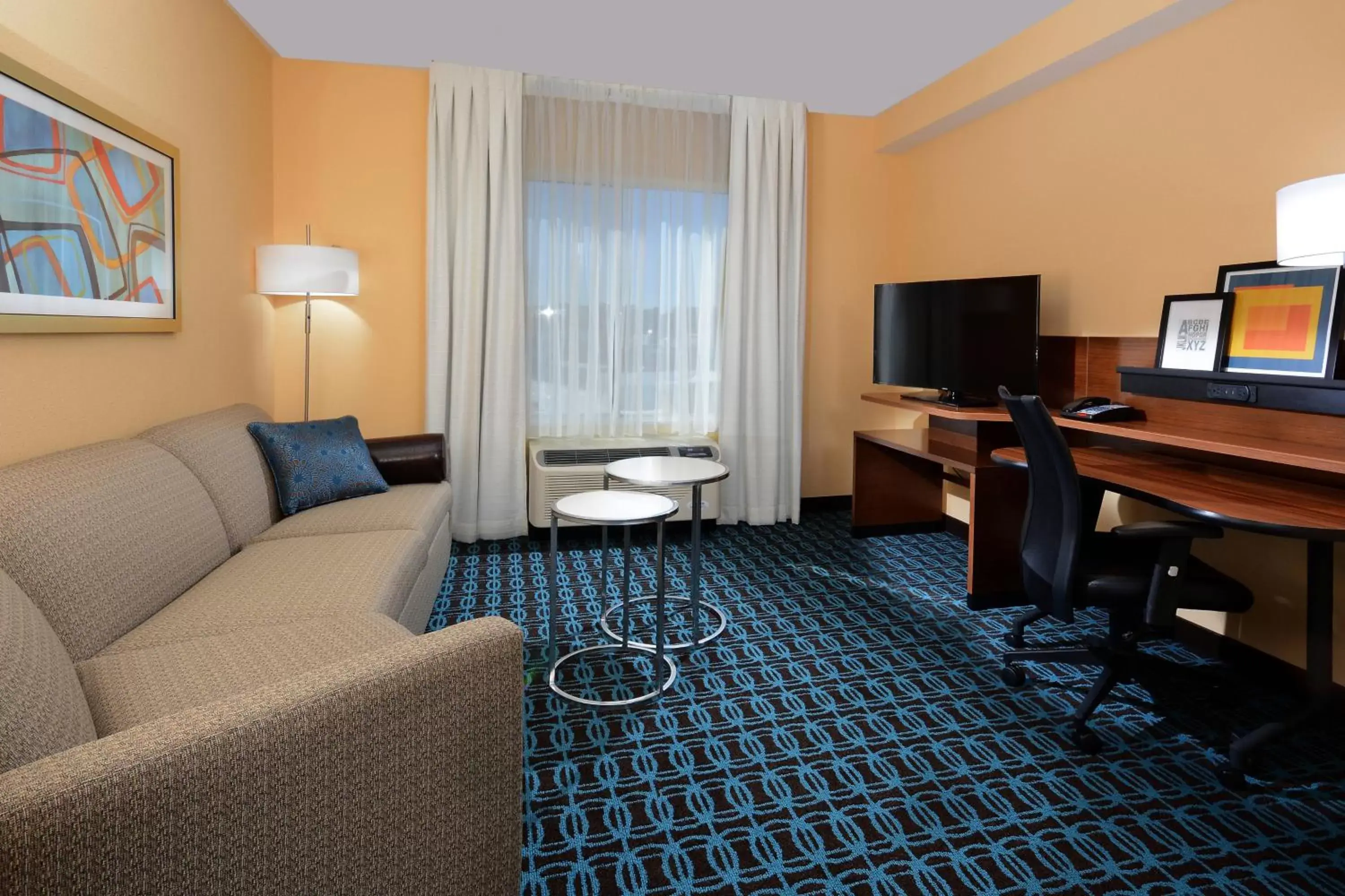 Living room, Seating Area in Fairfield Inn & Suites by Marriott Raleigh Capital Blvd./I-540