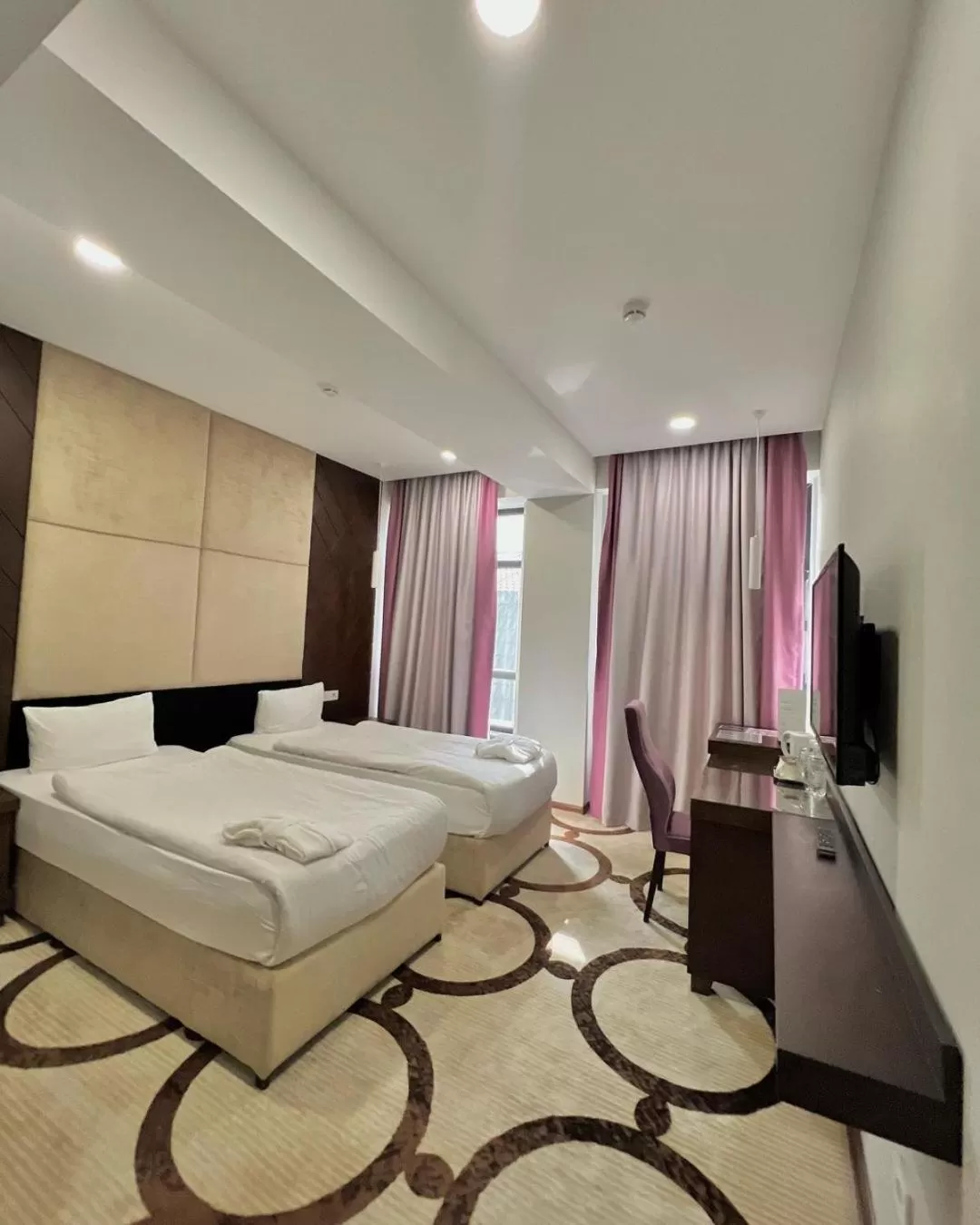 Bed in East Palace Hotel