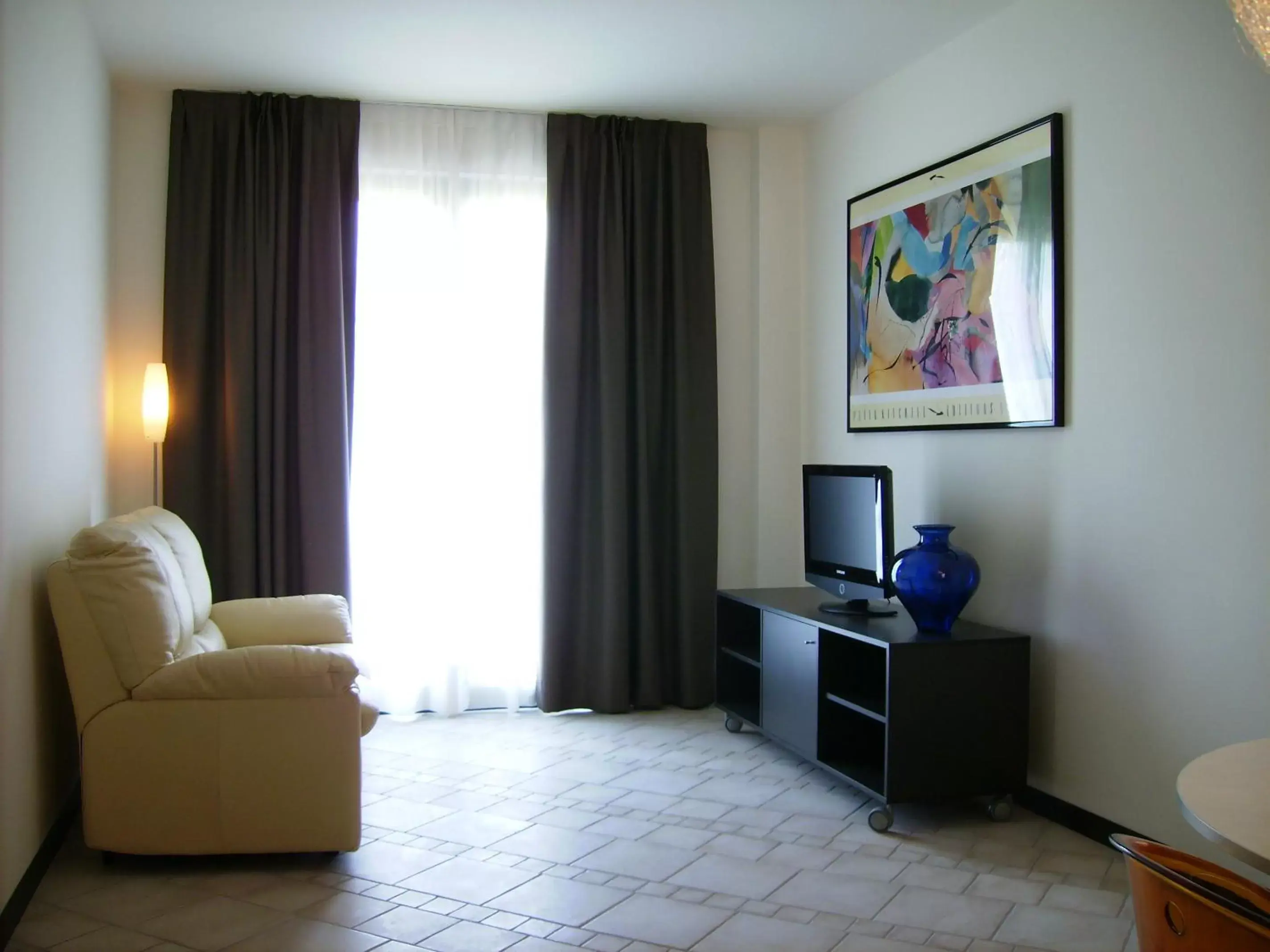 Living room, TV/Entertainment Center in CasAlbergo - Superior Lake Apartments