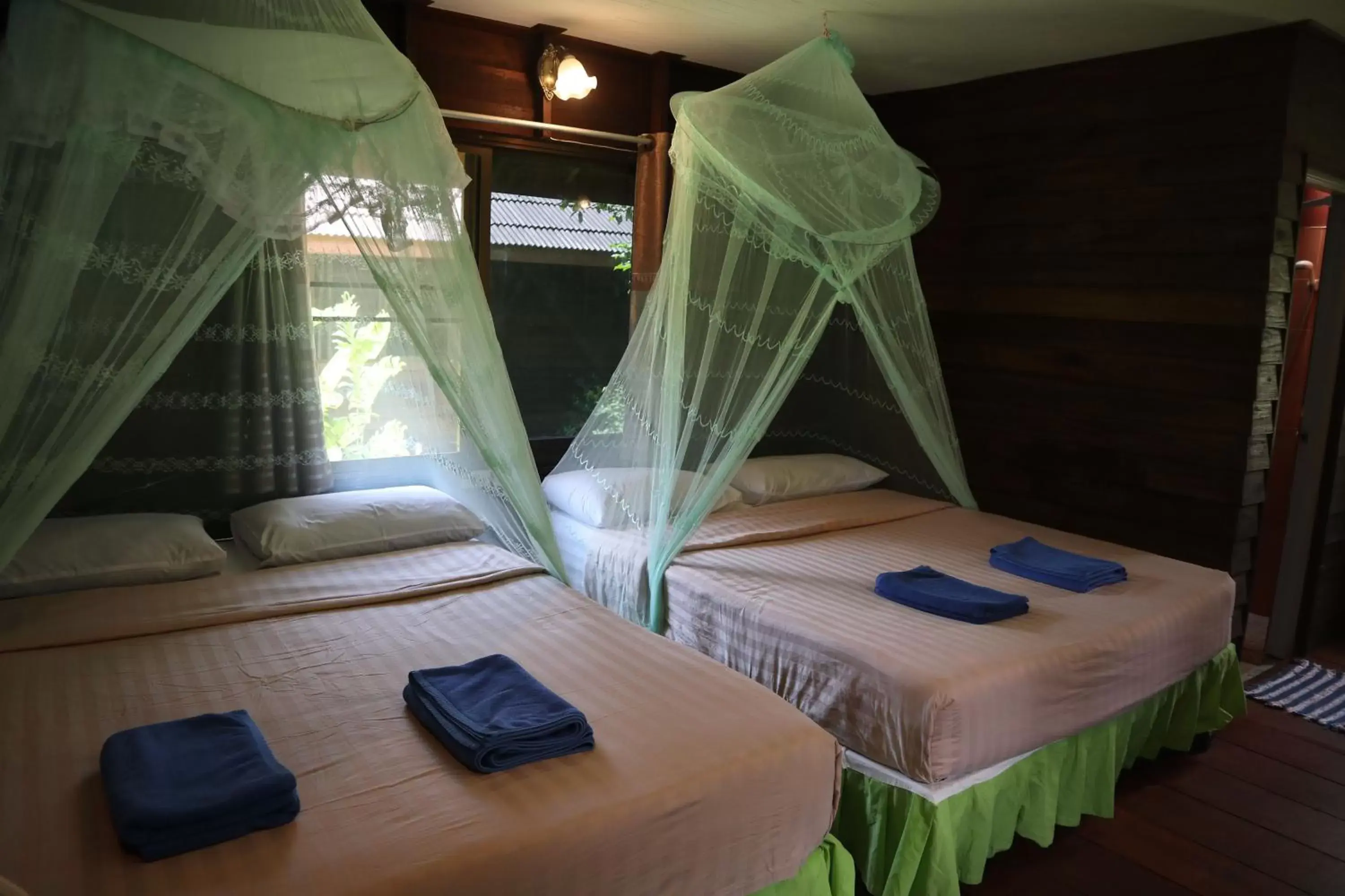 Bed in Khao Sok Morning Mist Resort