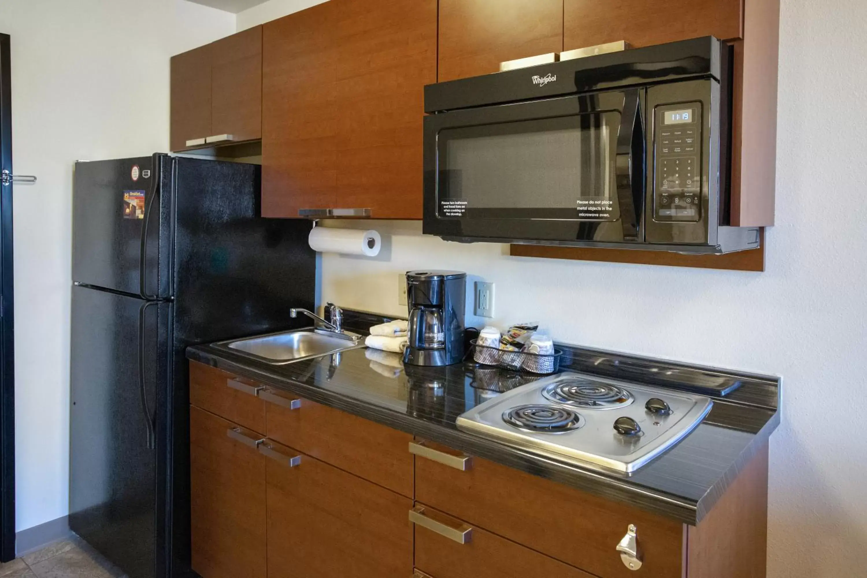 Kitchen or kitchenette, Kitchen/Kitchenette in My Place Hotel-Bismarck, ND