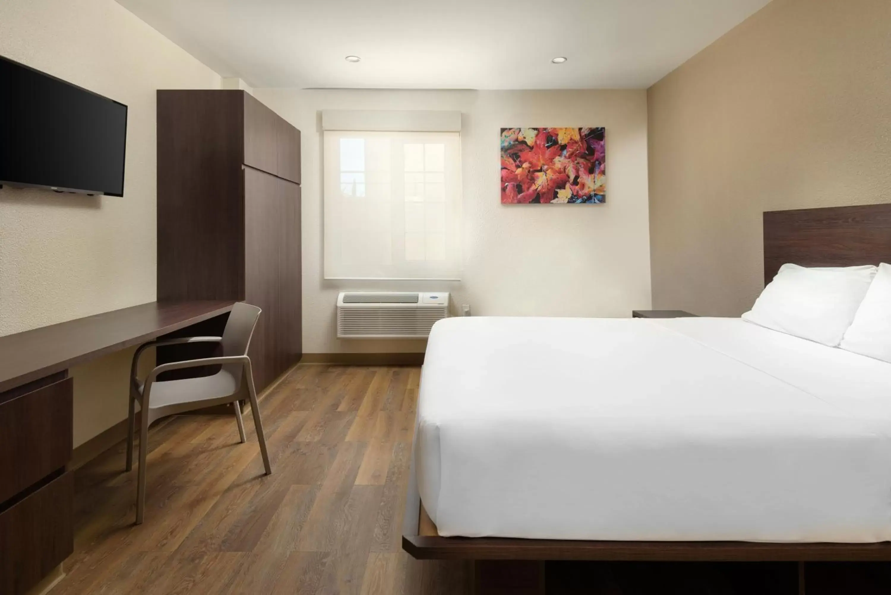 Bed in Extended Suites Tijuana Macroplaza