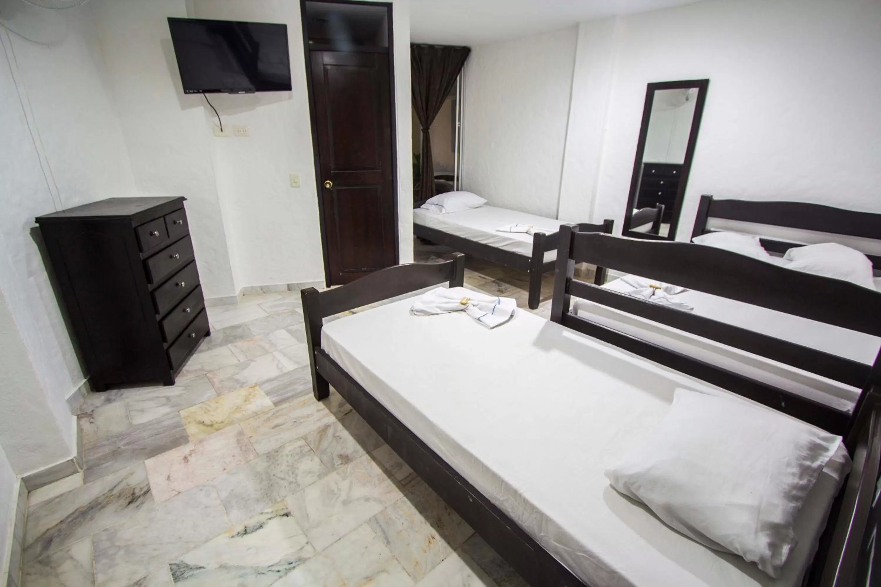 Bed in Blue Star Hotel