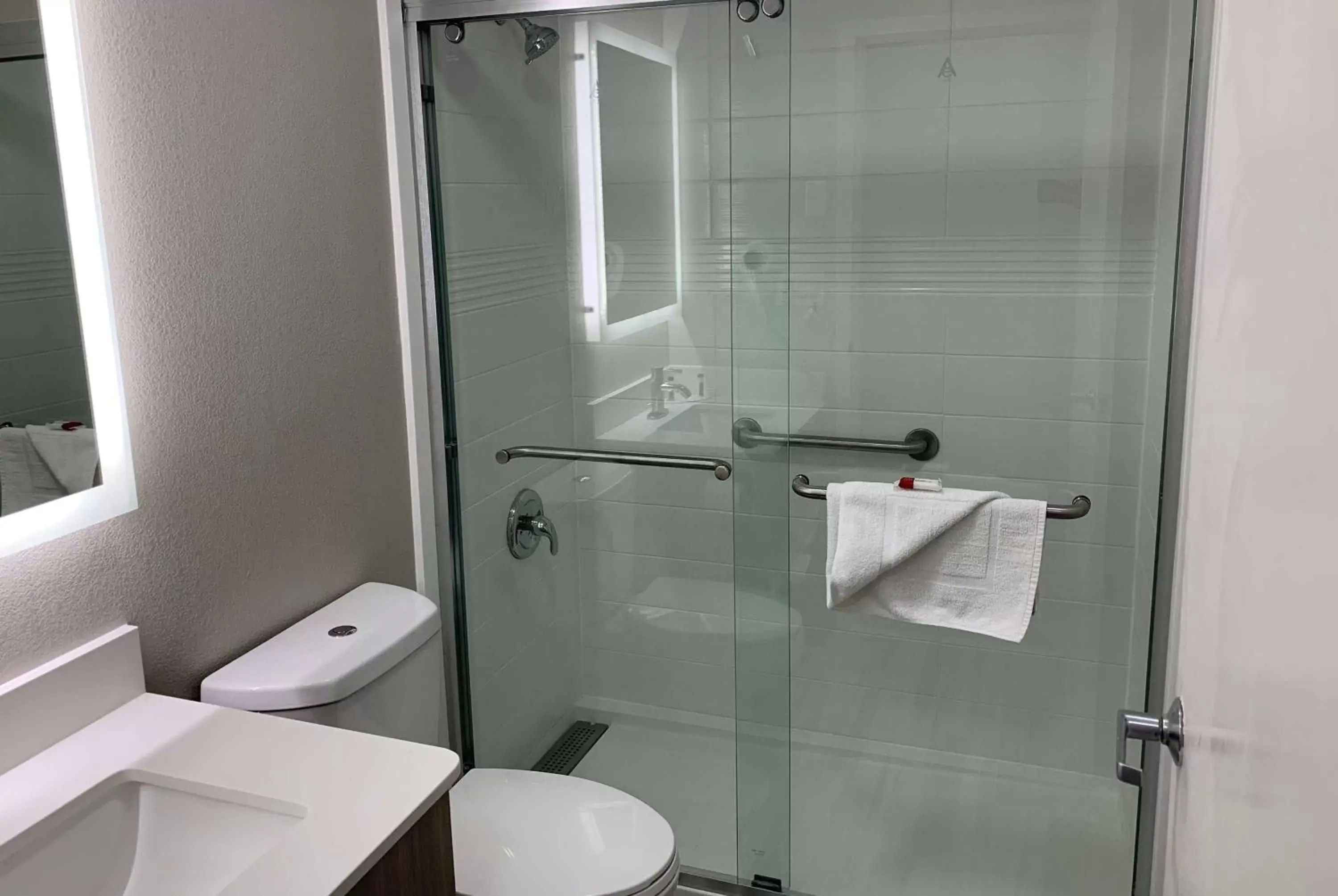 Bathroom in Microtel Inn by Wyndham Charlotte Airport