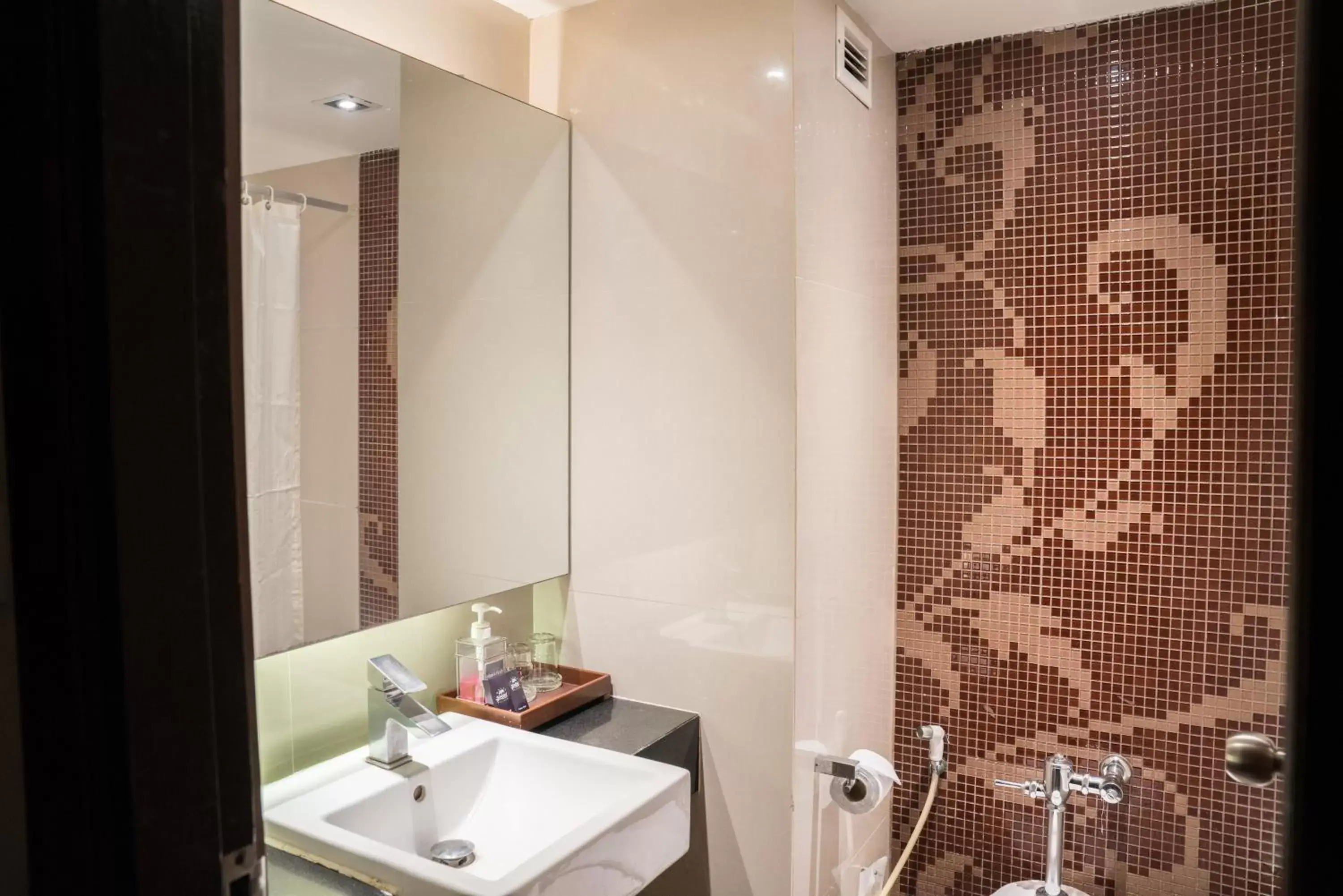 Bathroom in Grand Jomtien Palace Hotel - SHA Extra Plus