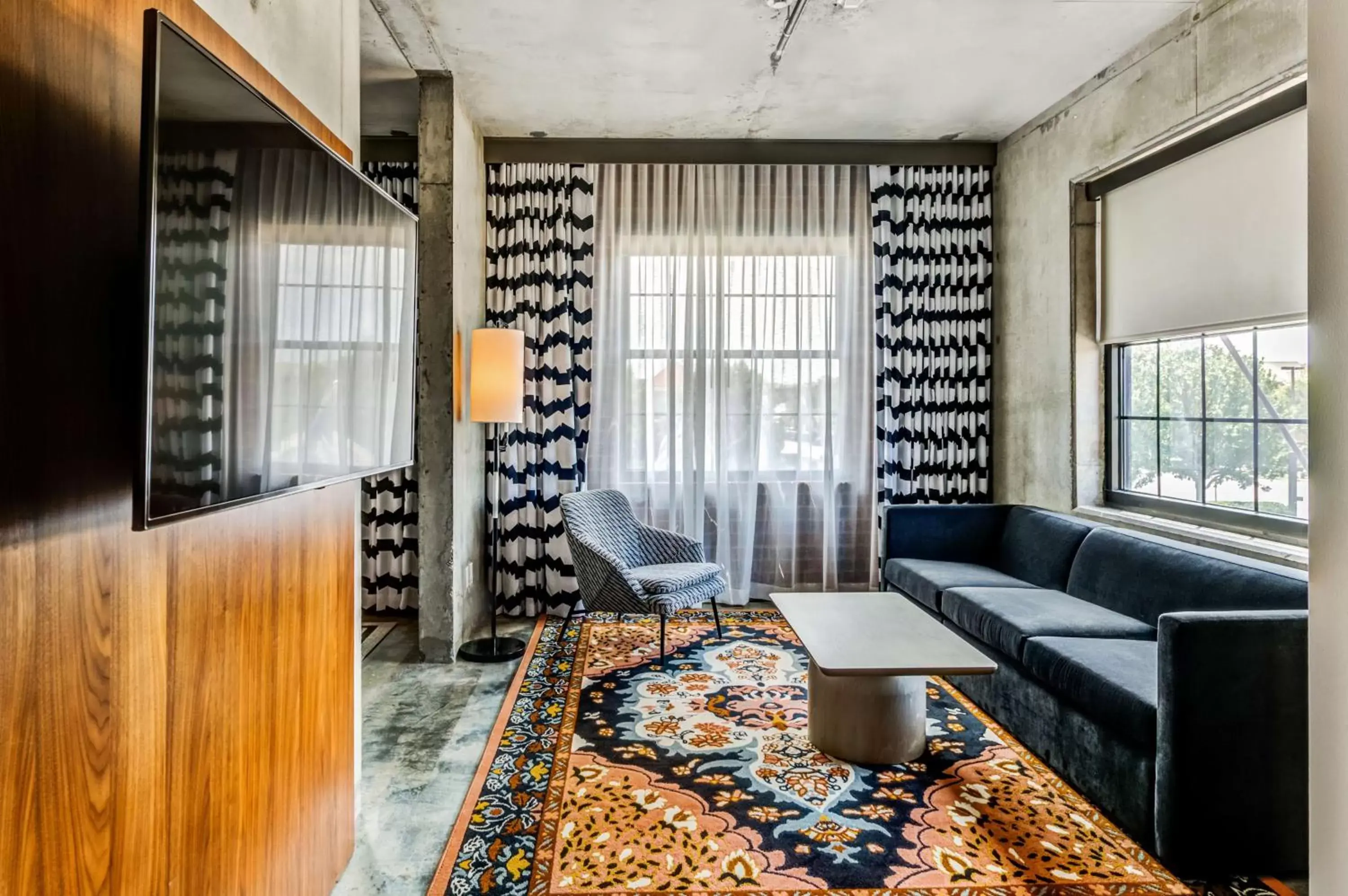 Living room, Seating Area in NYLO Las Colinas Hotel, Tapestry Collection by Hilton