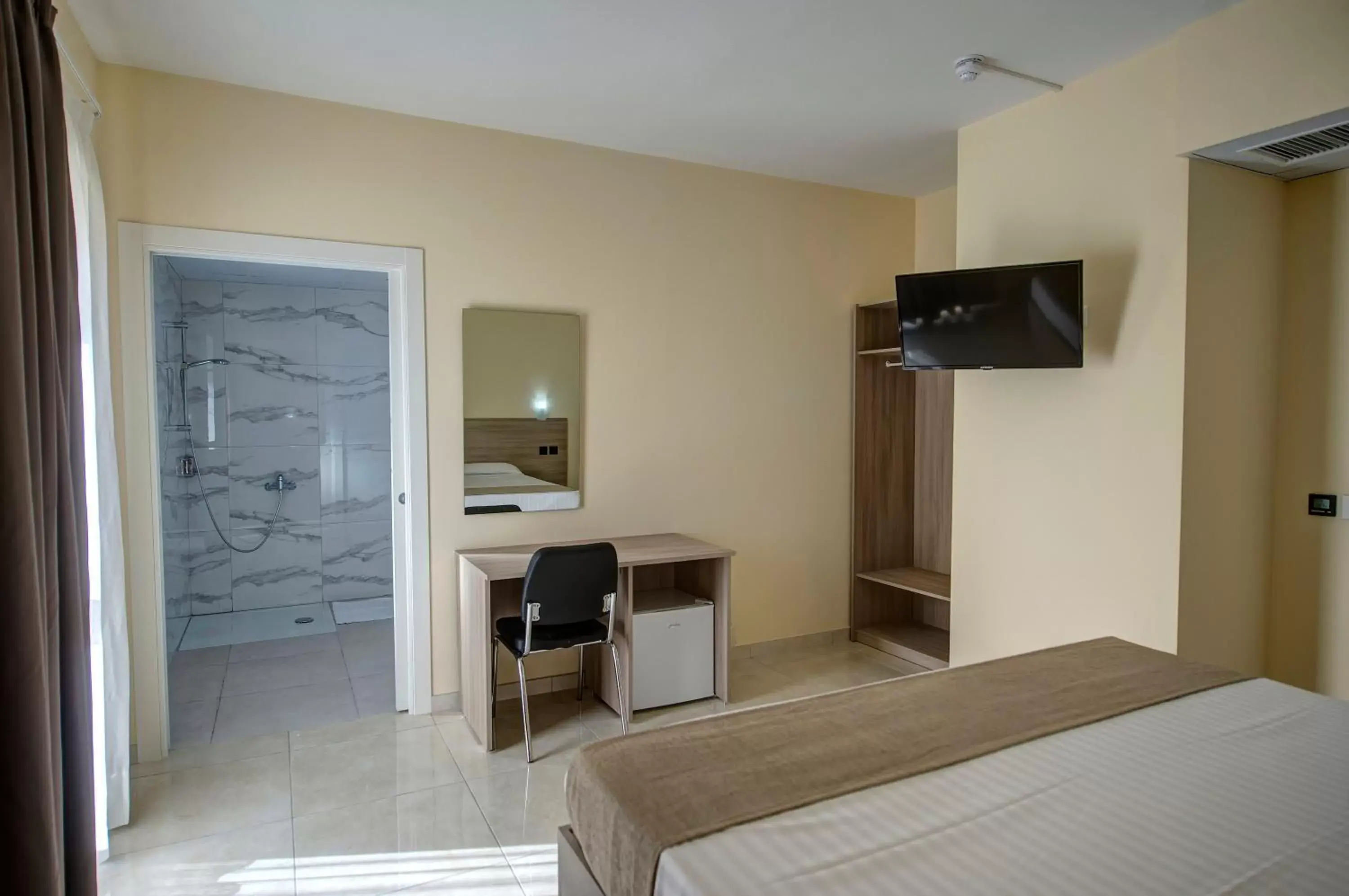 Bed in Allegro Hotel Bed in Allegro Hotel