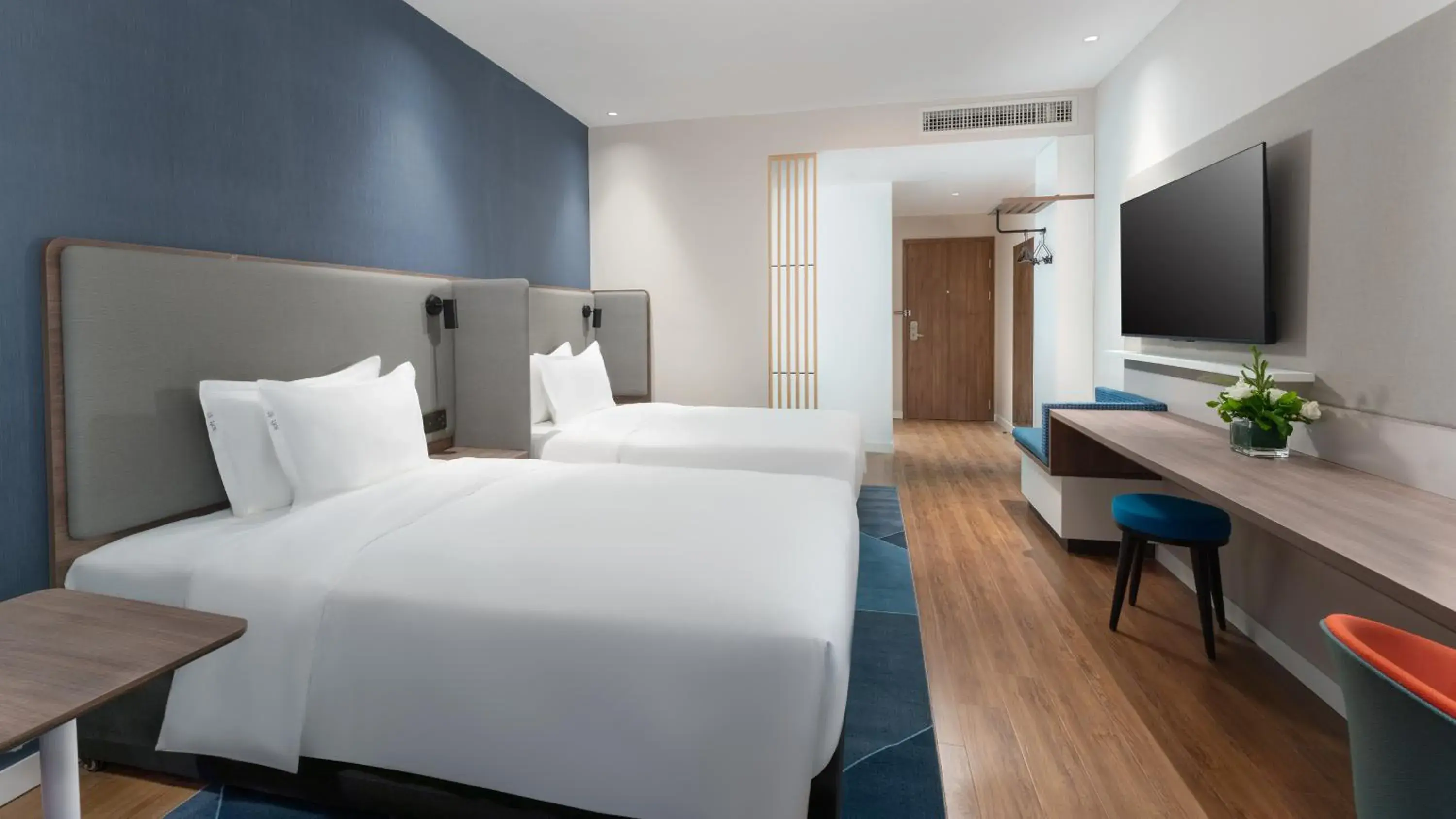 Bed in Holiday Inn Express Kunming Panlong, an IHG Hotel