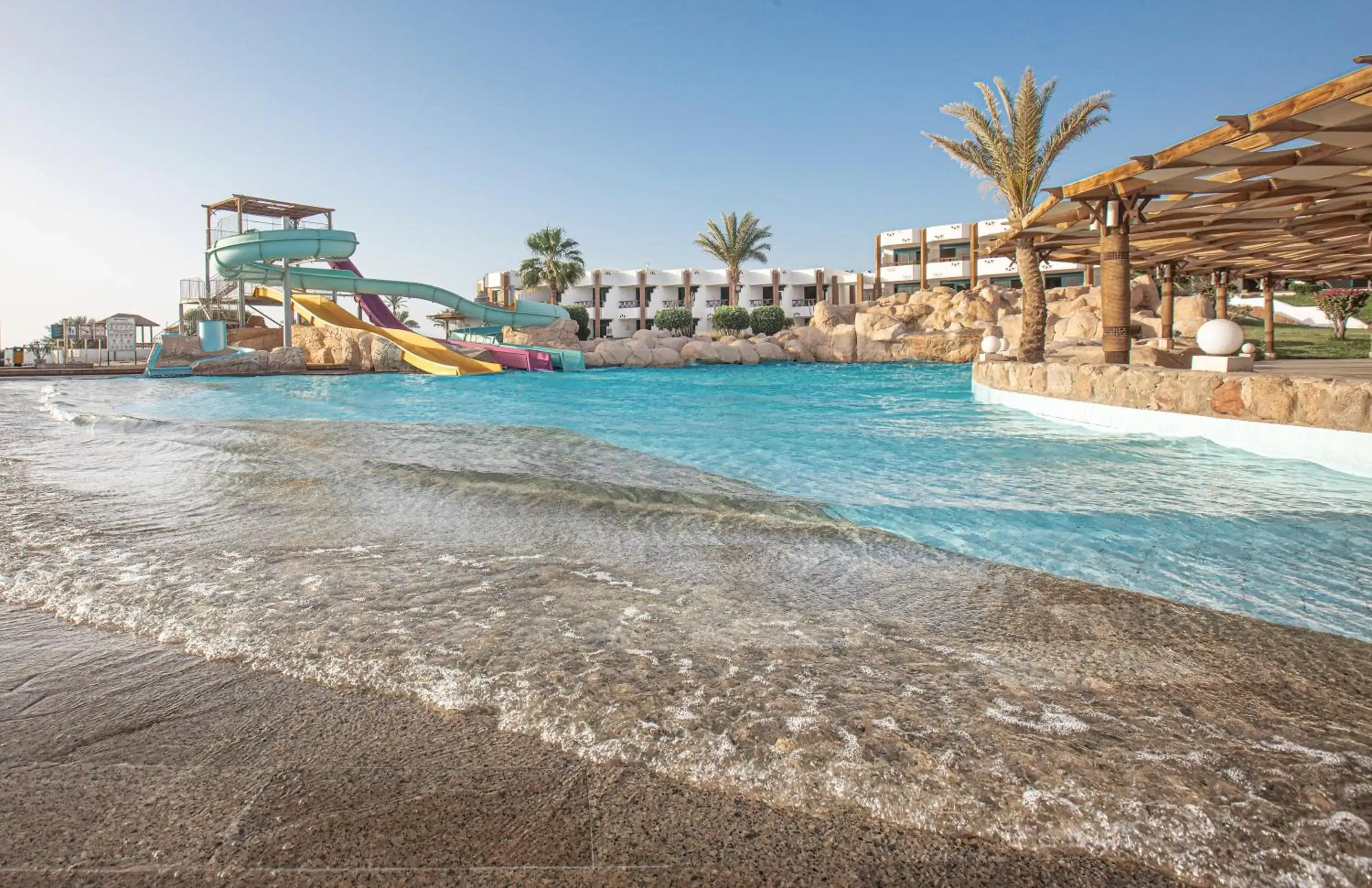 Swimming pool, Beach in Pyramisa Beach Resort Sharm El Sheikh