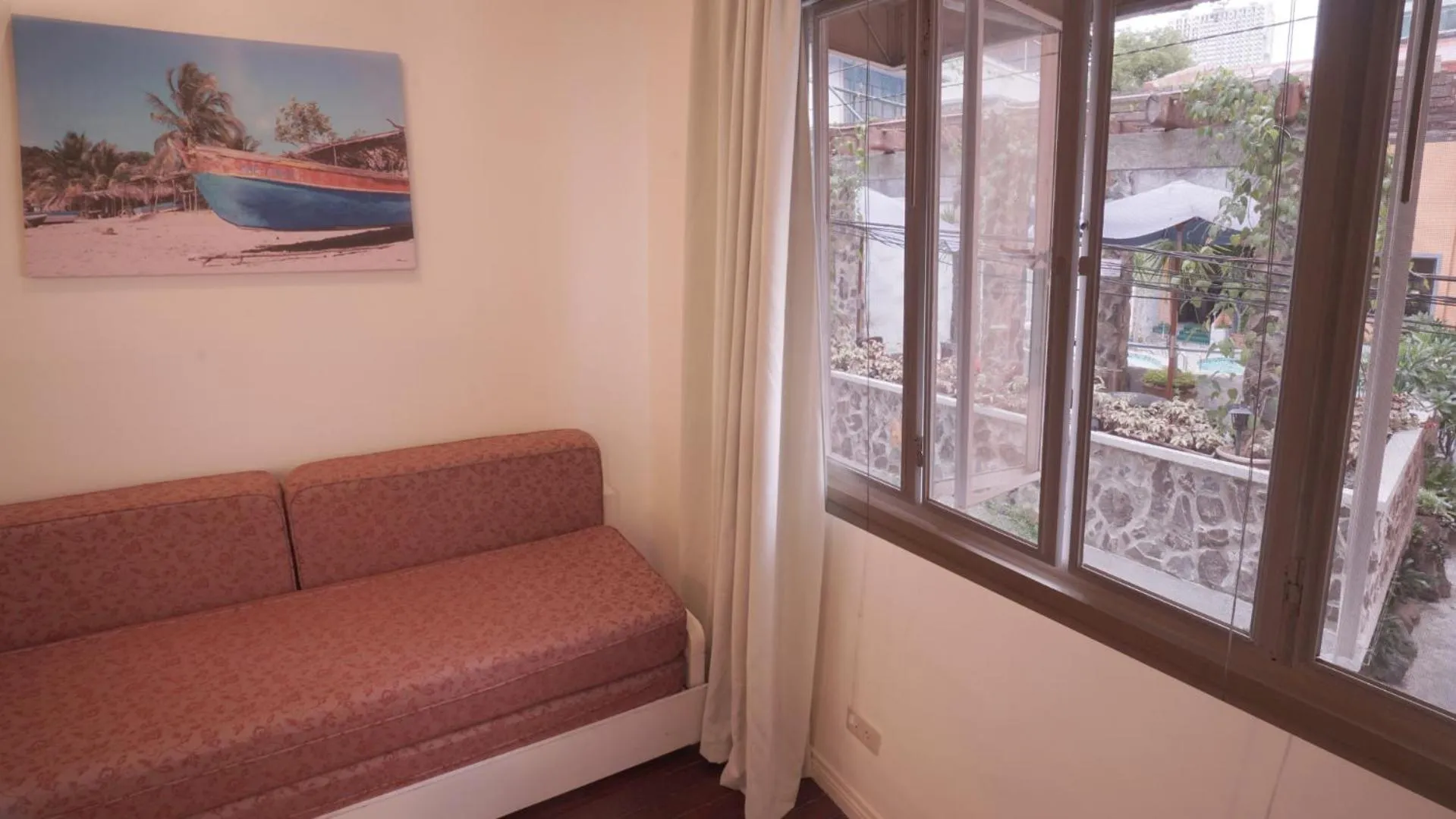 Seating area in 1775 Adriatico Suites