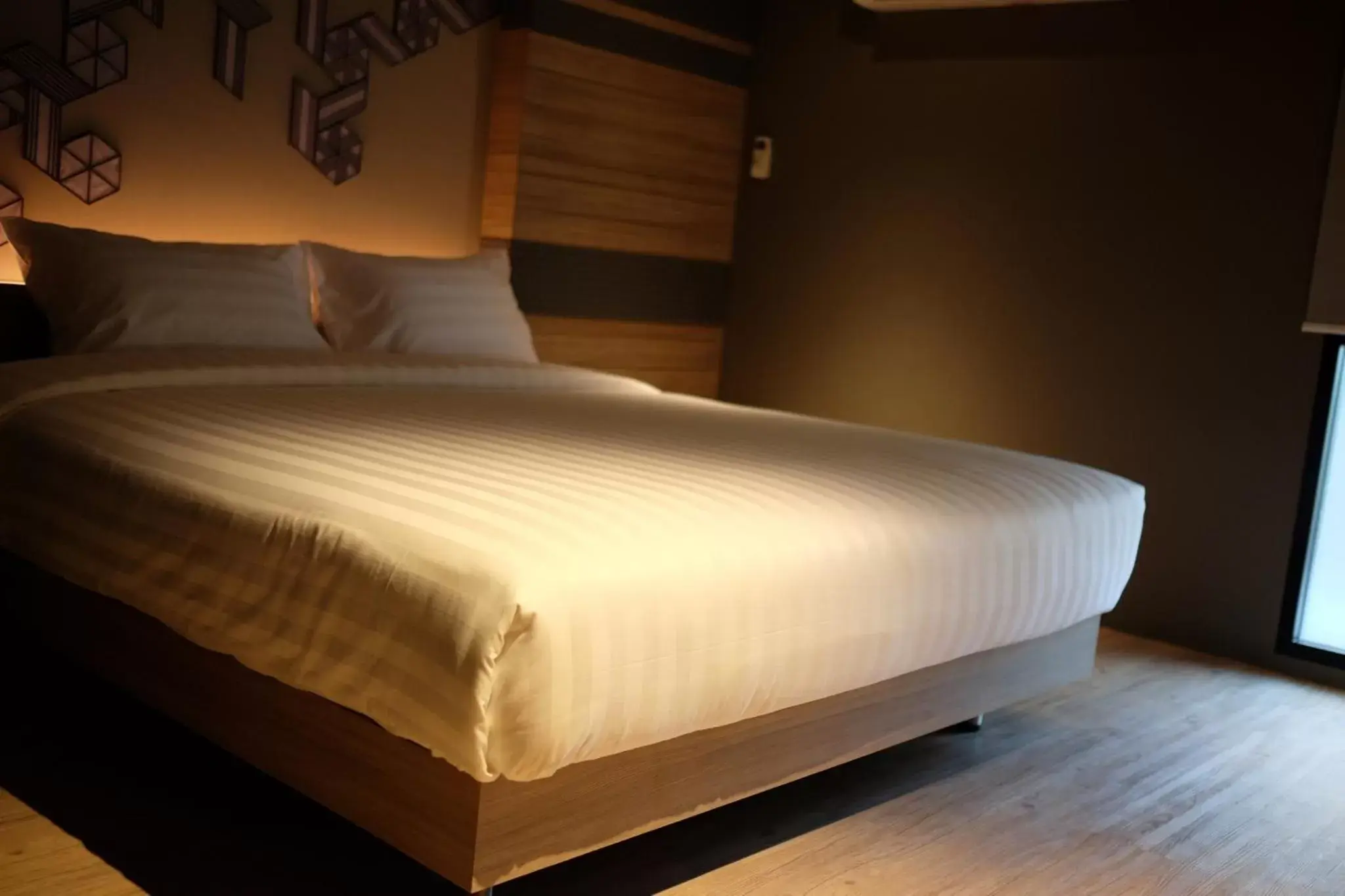 Bed in NAP Hotel Bangkok