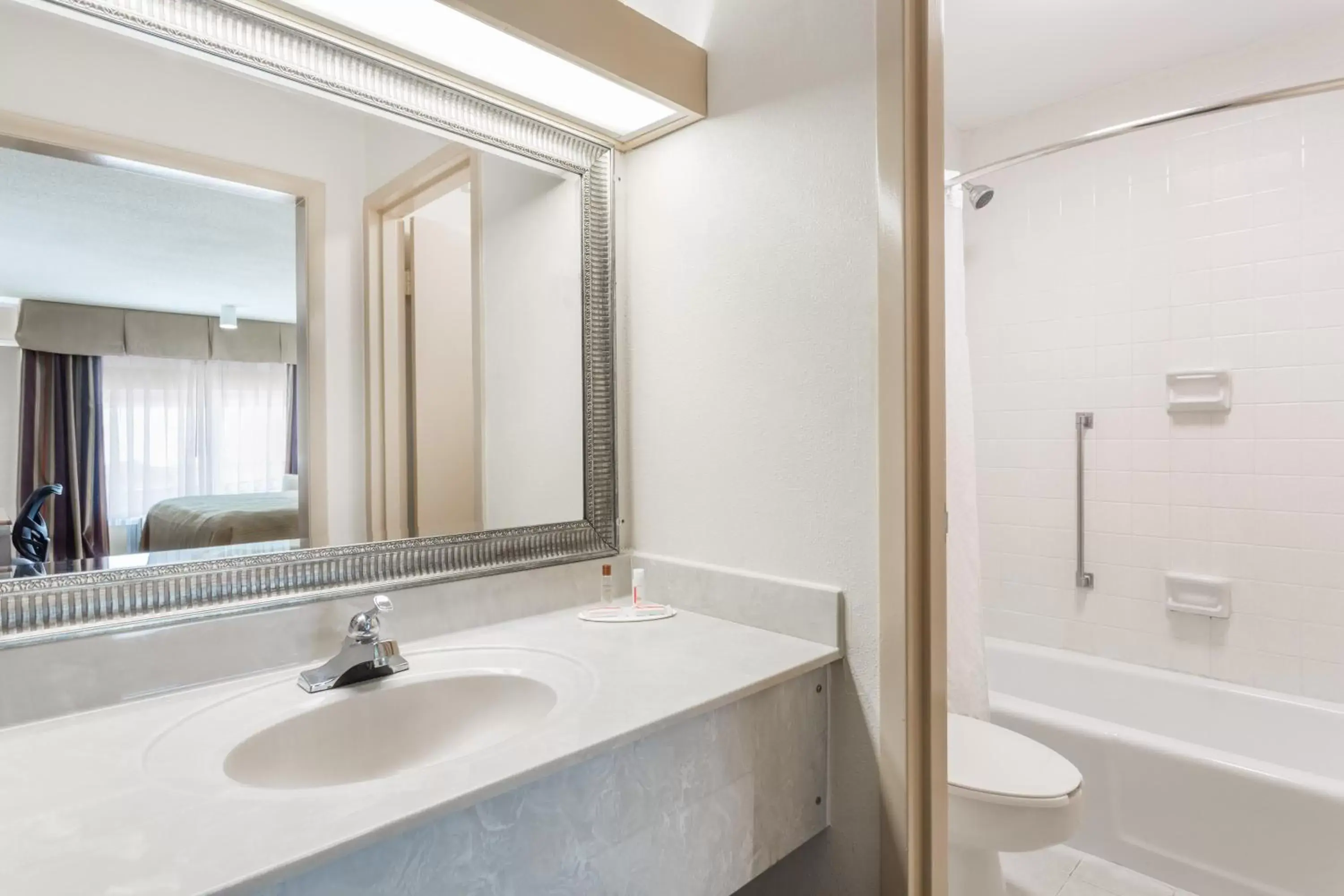 Bathroom in Days Inn & Conf Center by Wyndham Southern Pines Pinehurst Bathroom in Days Inn & Conf Center by Wyndham Southern Pines Pinehurst