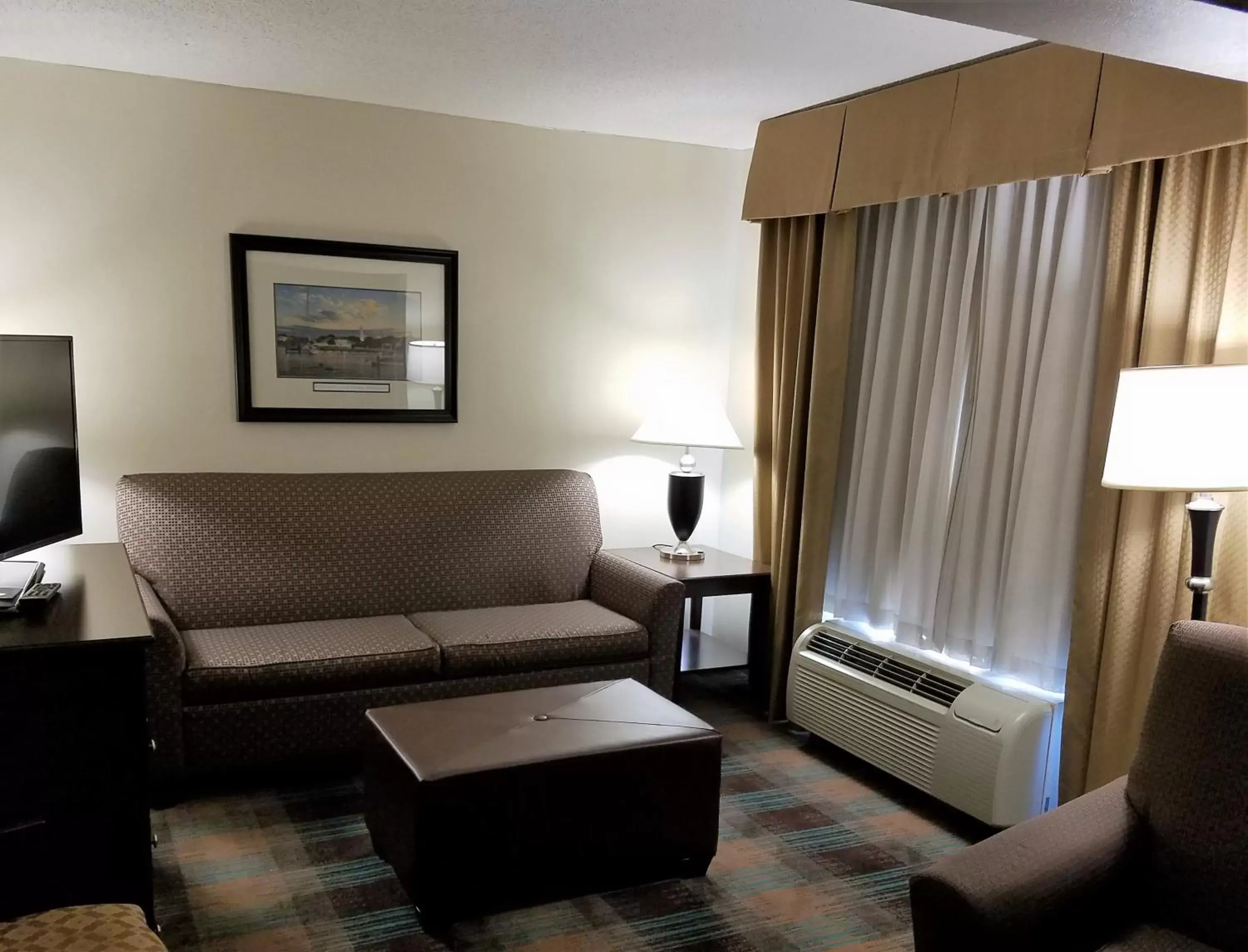 Bed, Seating Area in Wingate by Wyndham Greensboro