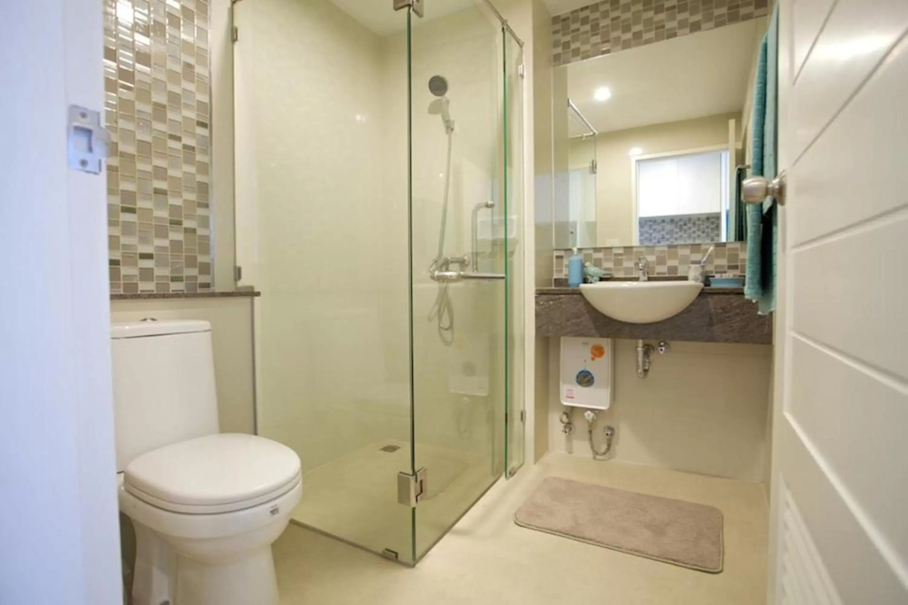 Bathroom in Cinnamon Residence SHA Plus