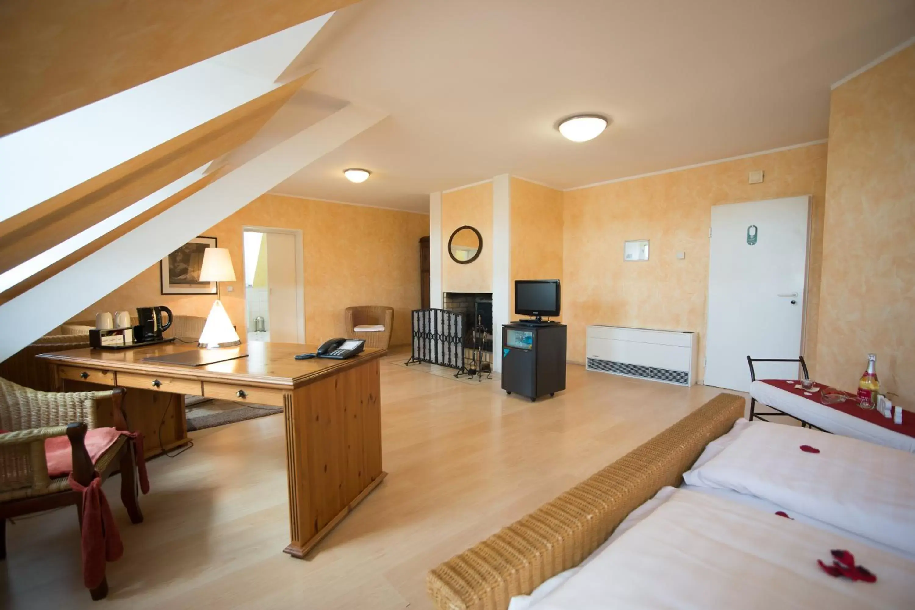 Bed, Seating Area in Trip Inn PostHotel Düren