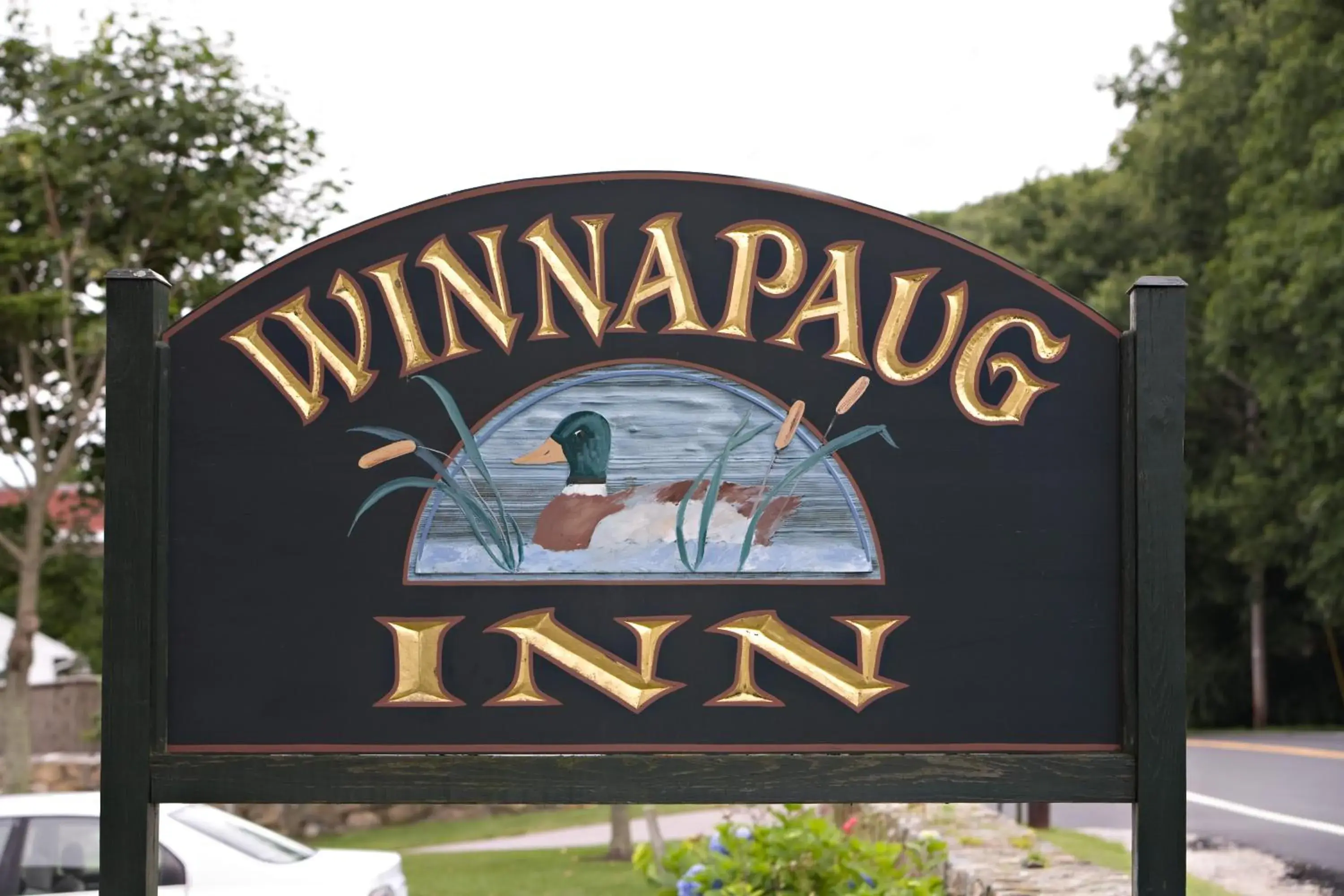Property Logo/Sign in Winnapaug Inn