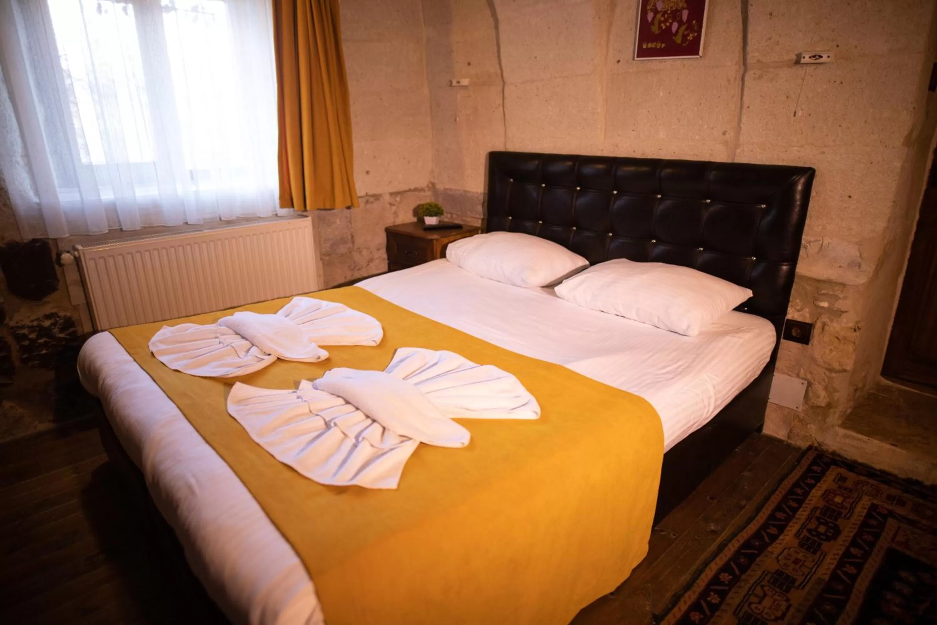 Bed in 7 Oda Kapadokya Cave Hotel