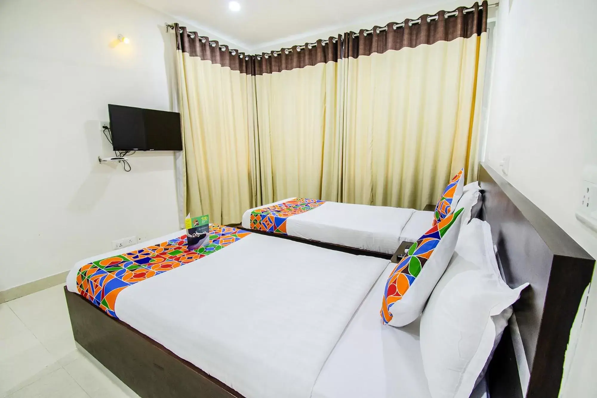 Bed in FabHotel Pride Inn - Nr TCS Deccan Park, Hitech City Bed in FabHotel Pride Inn - Nr TCS Deccan Park, Hitech City