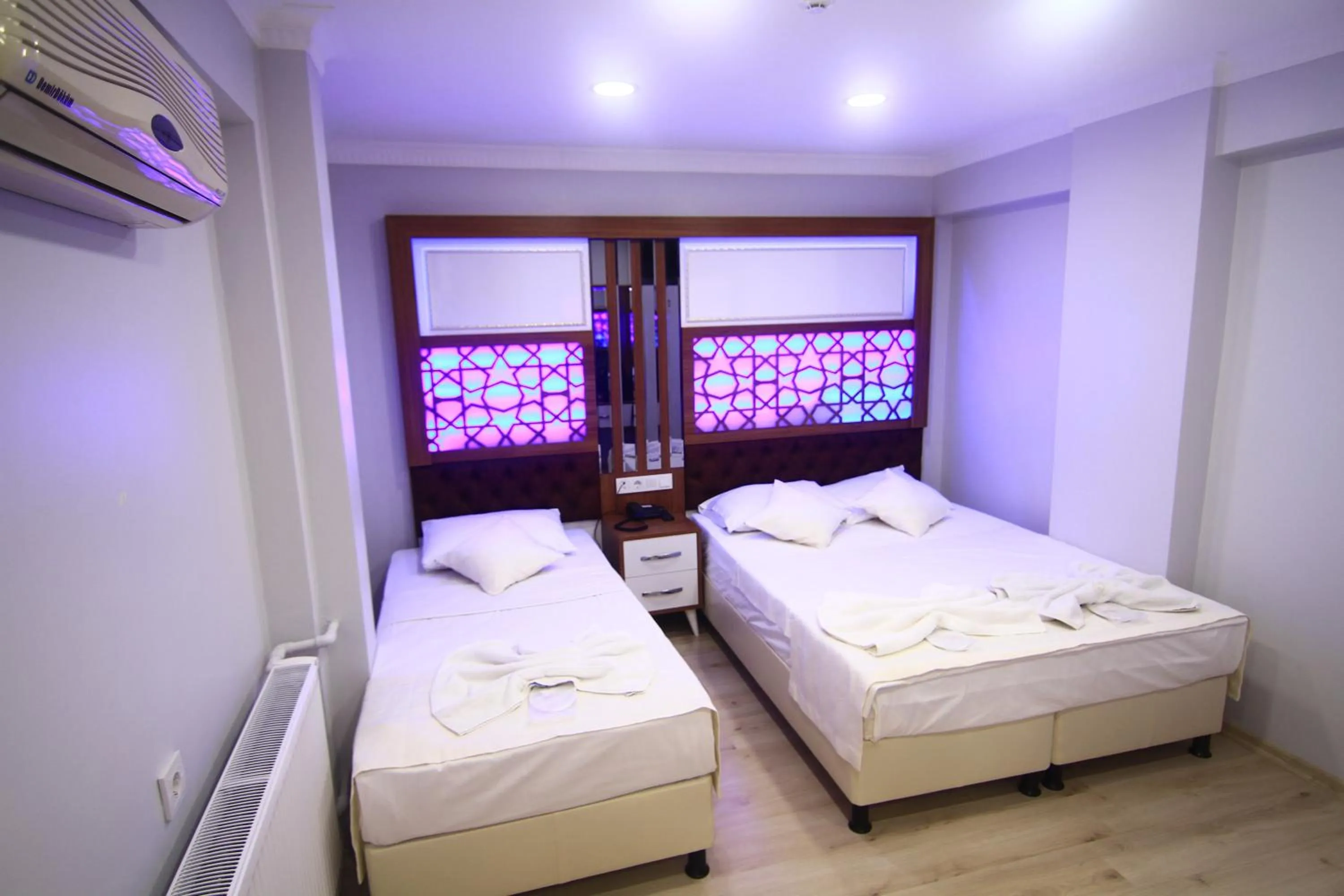 Photo of the whole room, Bed in Grand Liza Hotel