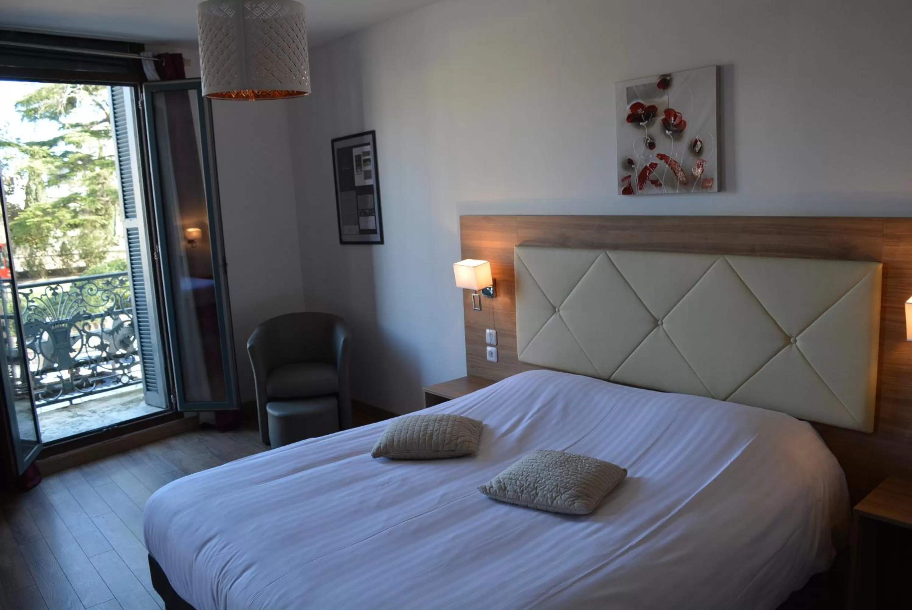 Bed in Le Grand Hôtel Molière