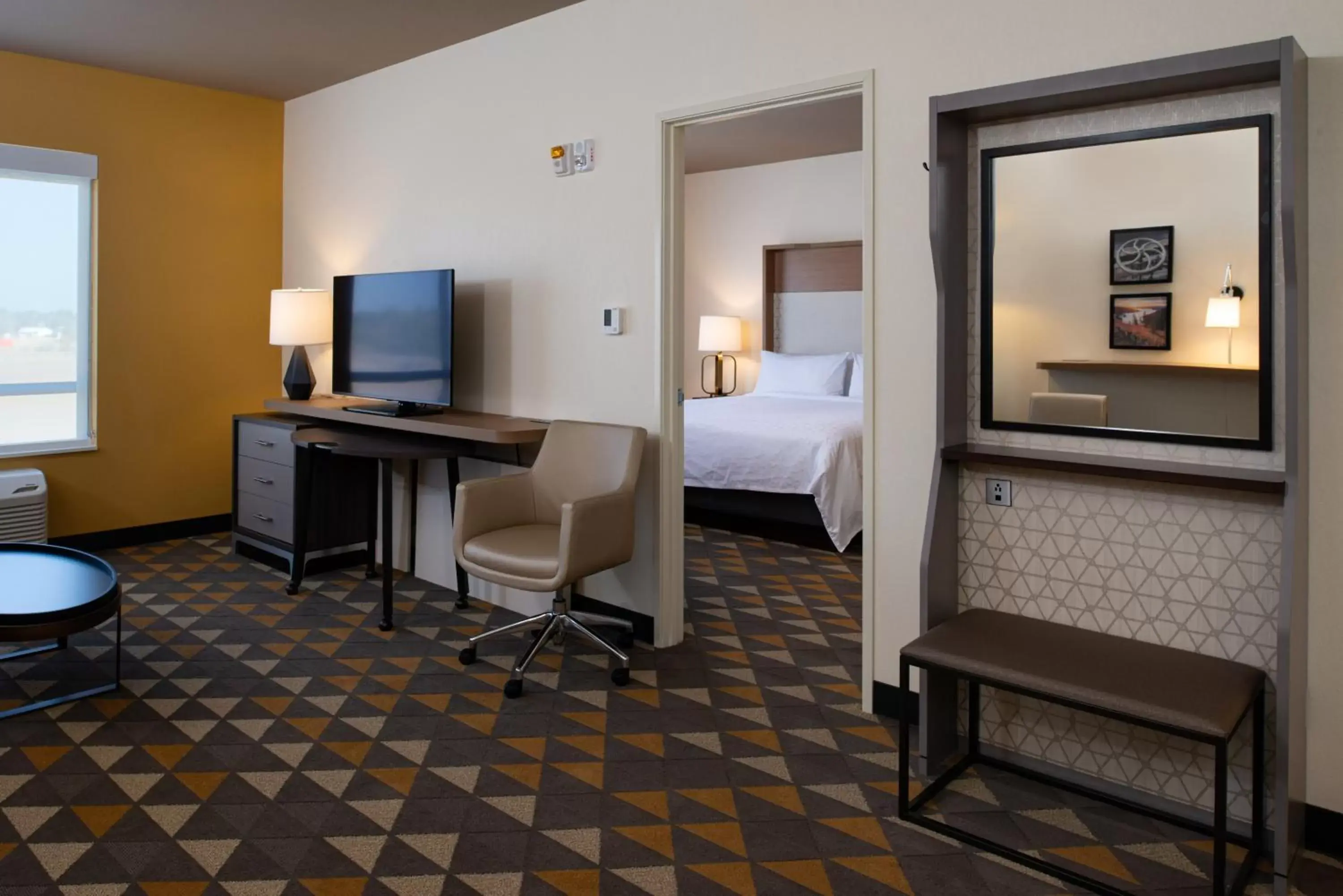 Photo of the whole room, TV/Entertainment Center in Holiday Inn & Suites - Idaho Falls, an IHG Hotel