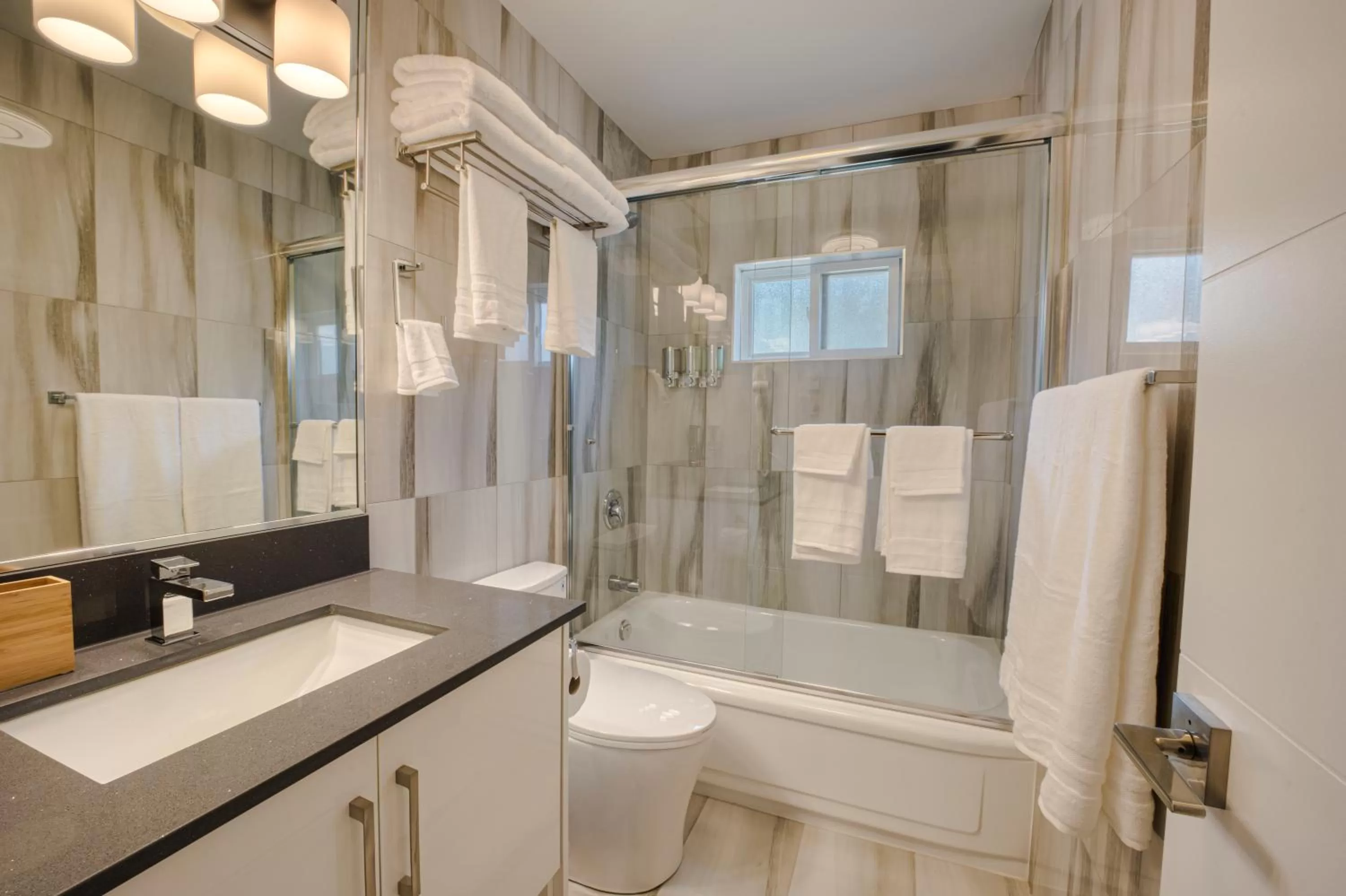 Toilet in Harrison Grand Motel