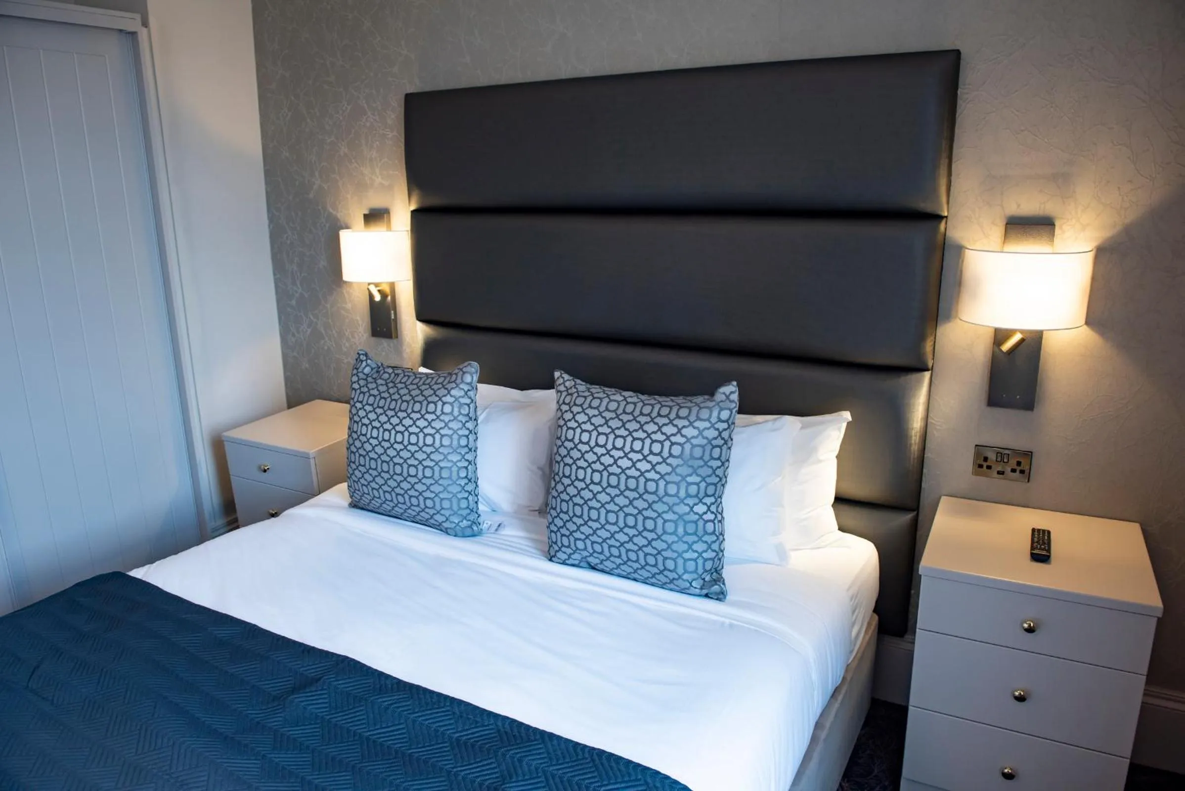 Bed in The Haycock Manor Hotel