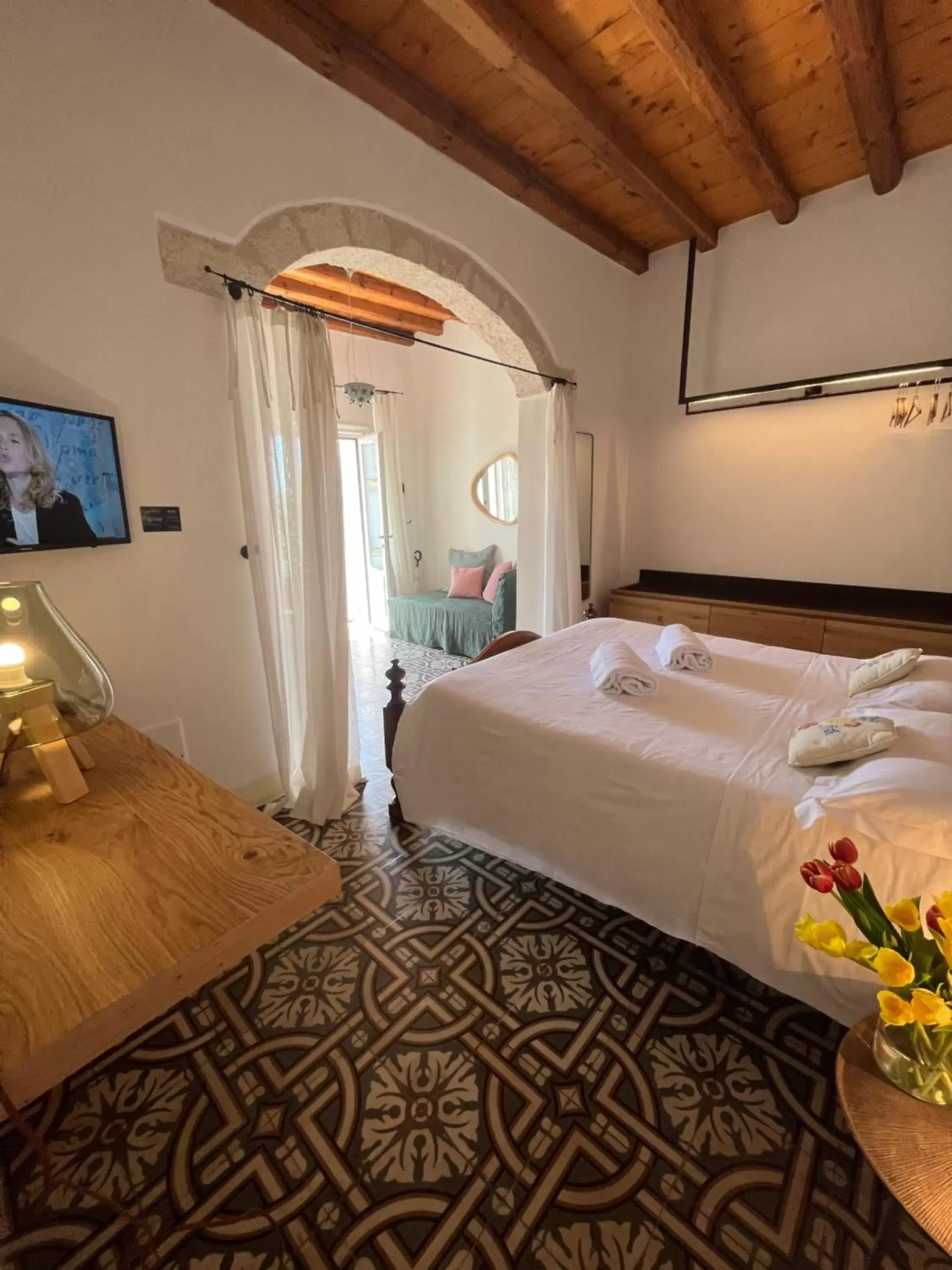 Bed in Antico Mondo Rooms & Suites